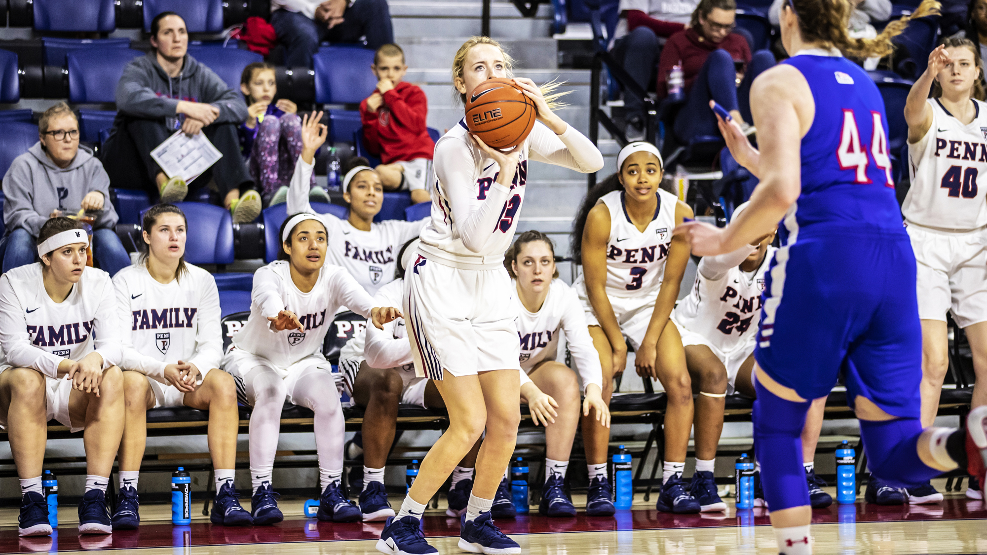 Phoebe Sterba shoots a three against American in the WNIT.