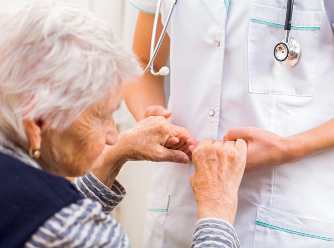  Elderly woman receiving nursing care
