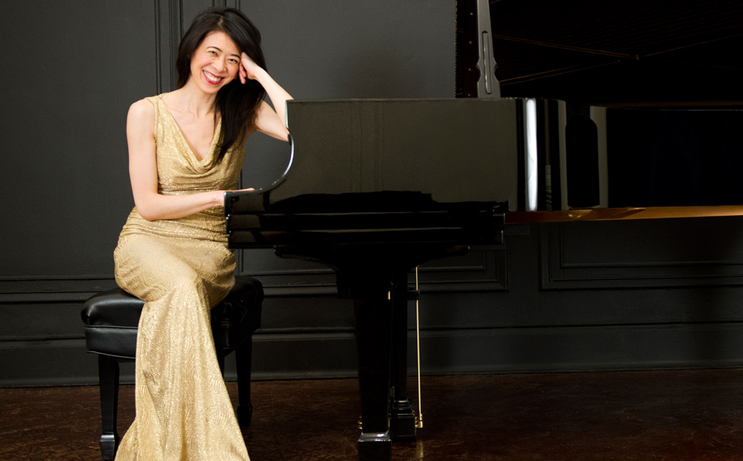 Jenny Lin in dress by piano