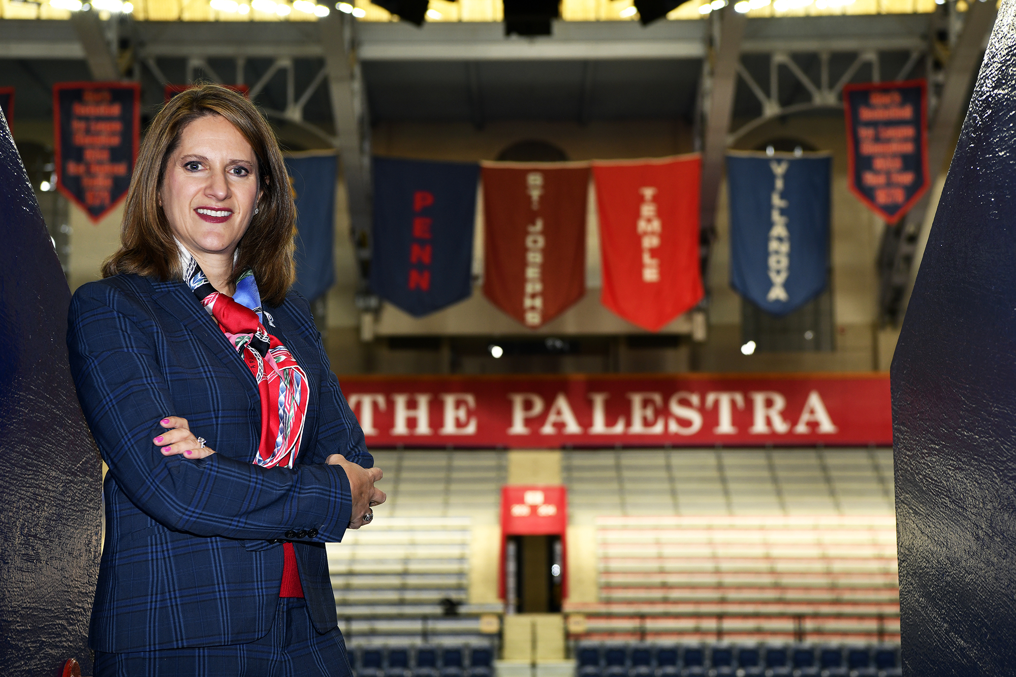 AD M. Grace Calhoun poses in the concourse at the Palestra.