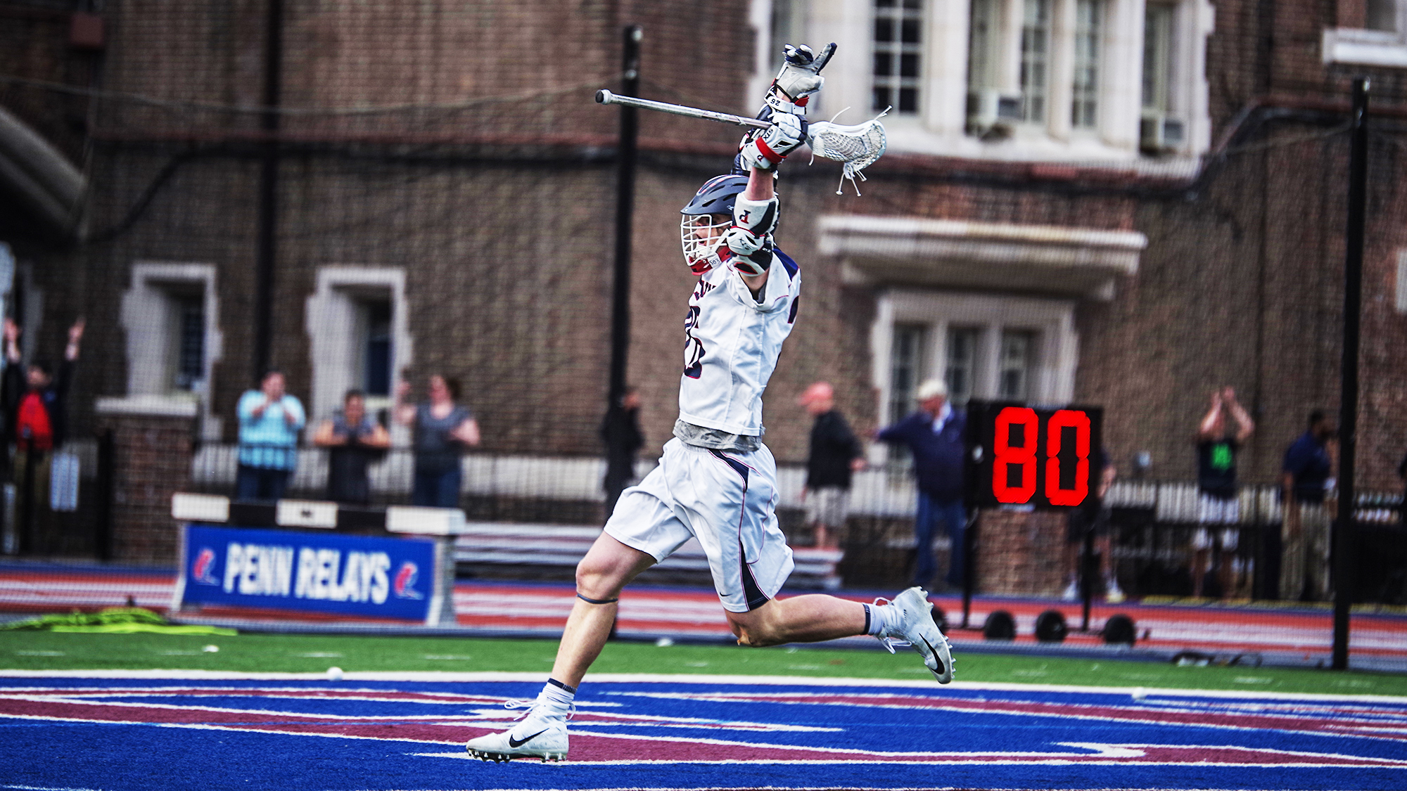Freshman attacker Sam Handley celebrates after scoring the game-winning goal against Yale at Franklin Field.