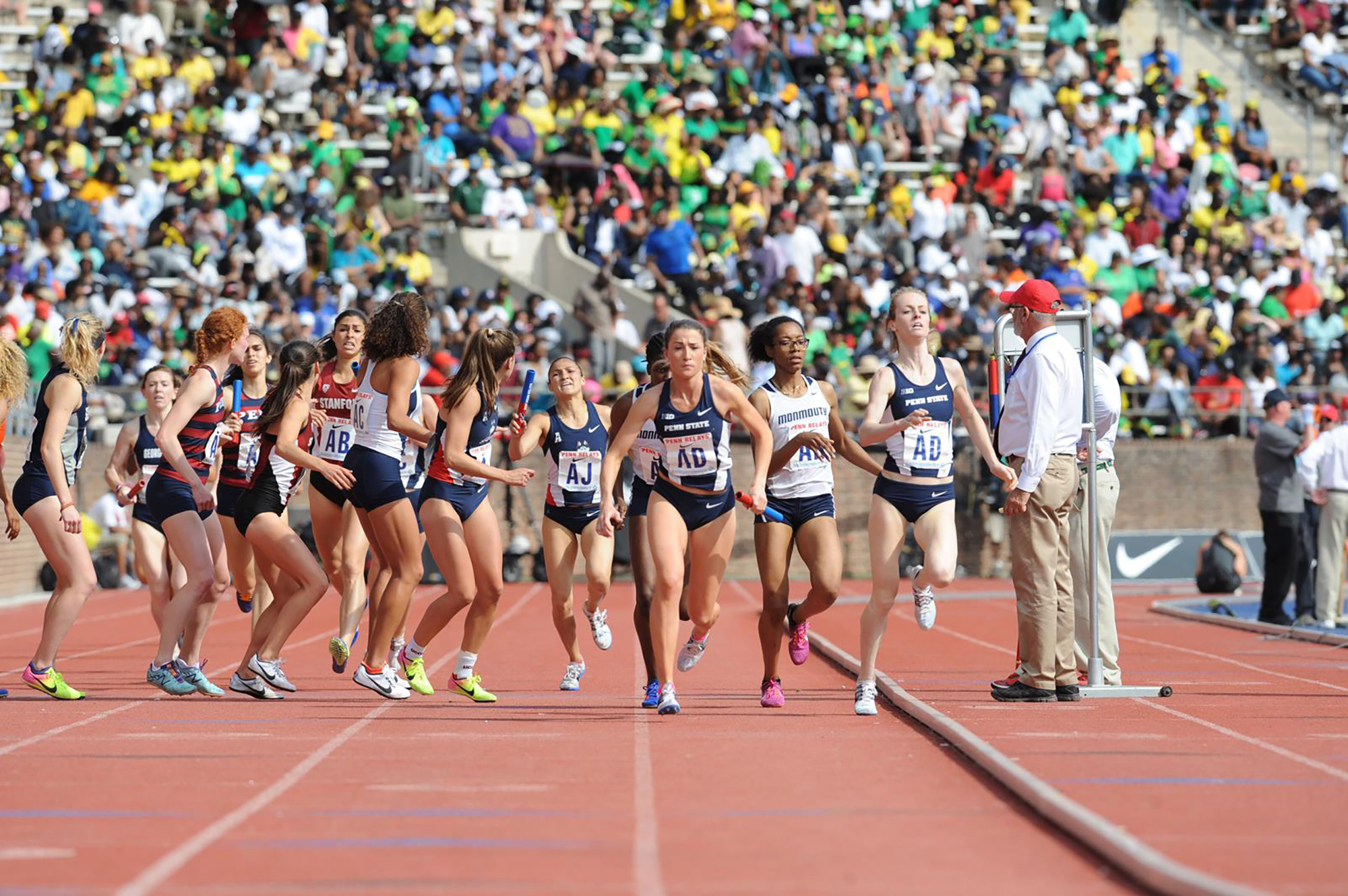 A group of women run a race at the Penn Relays.