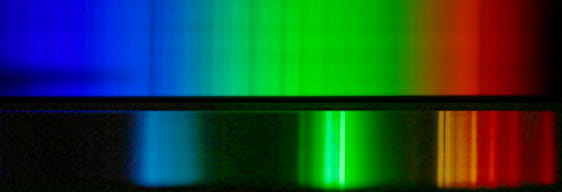 two rainbow-colored spectra, one that has a complete set of colors and one that is disjointed
