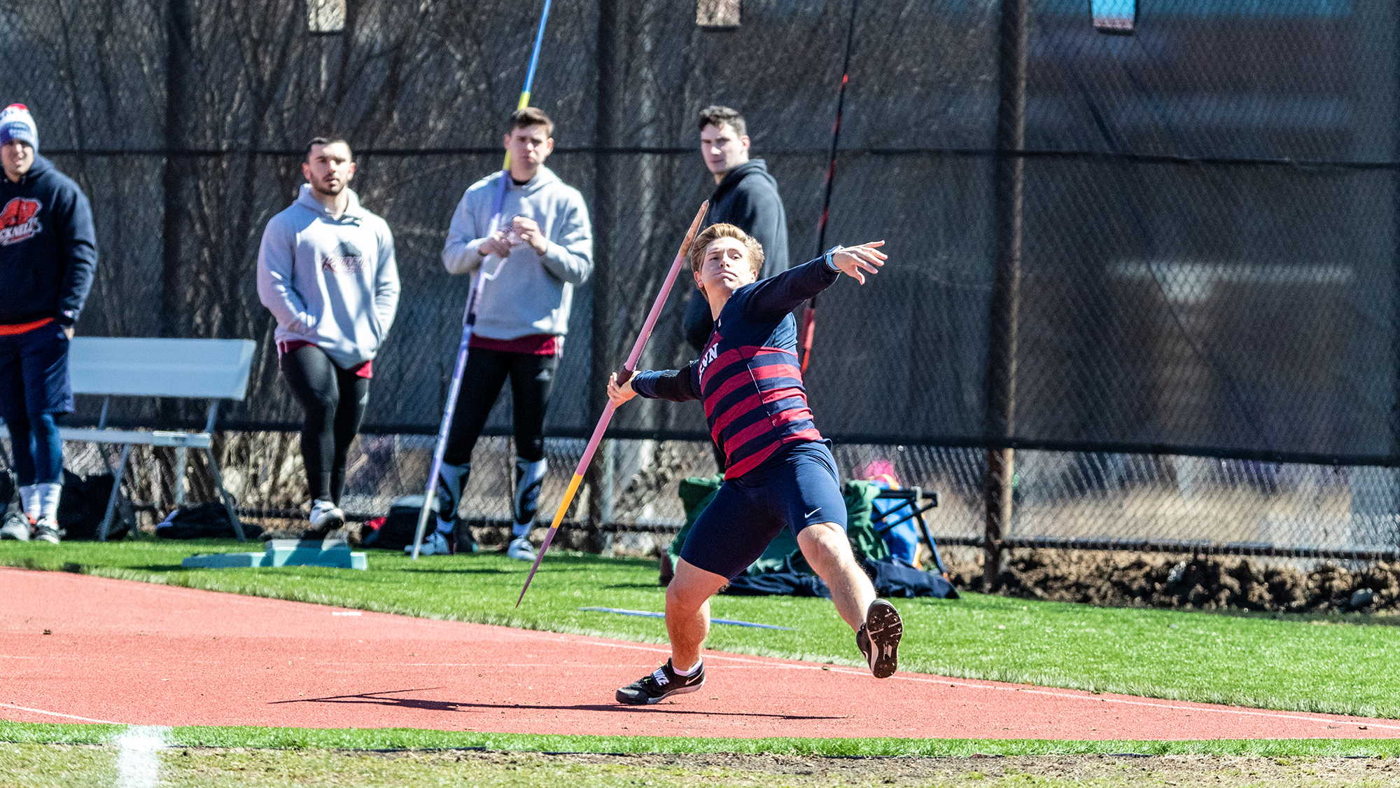 Marc Minichello does the javelin throw at an event.