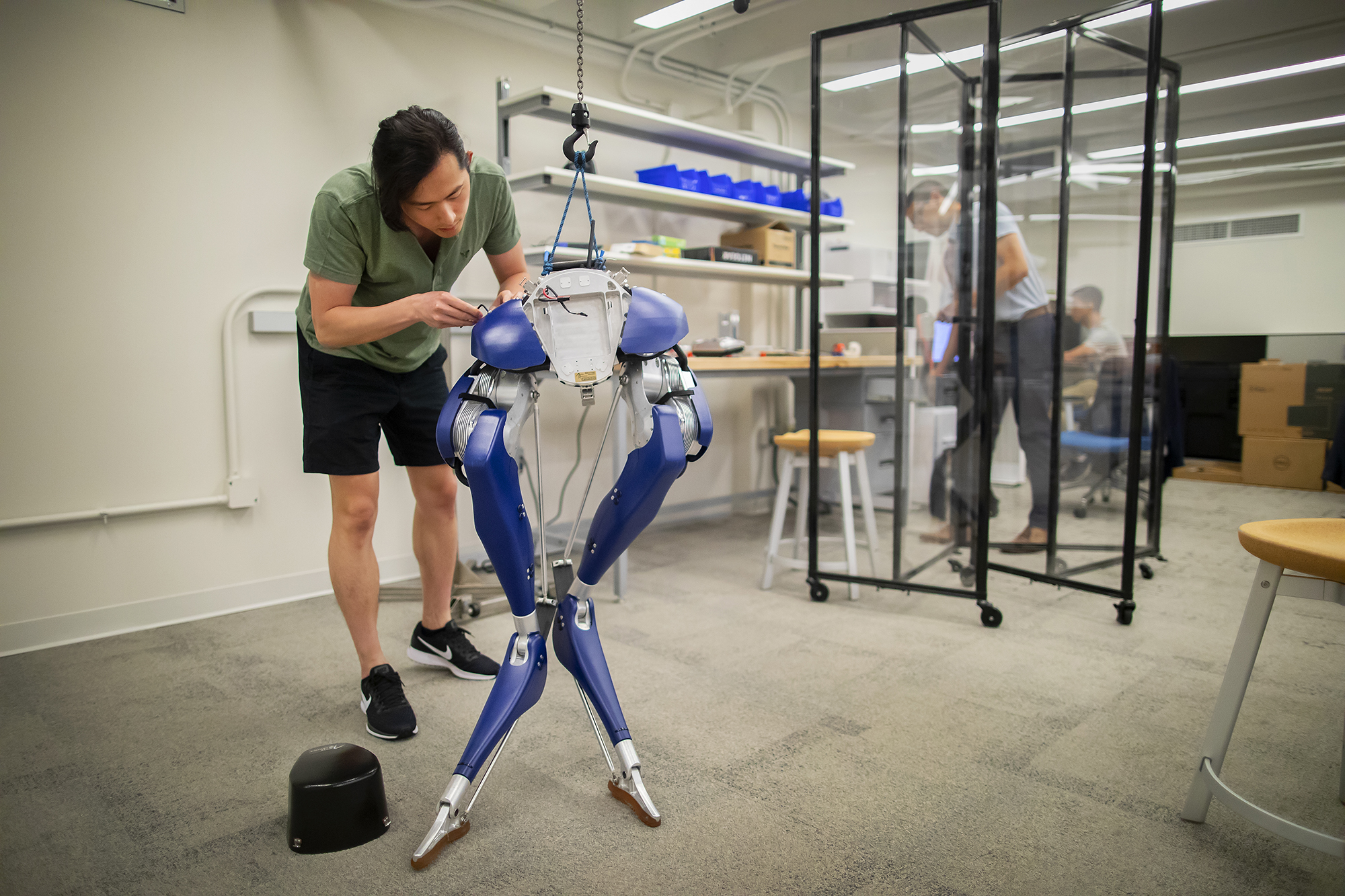 chen works on the robotic legs