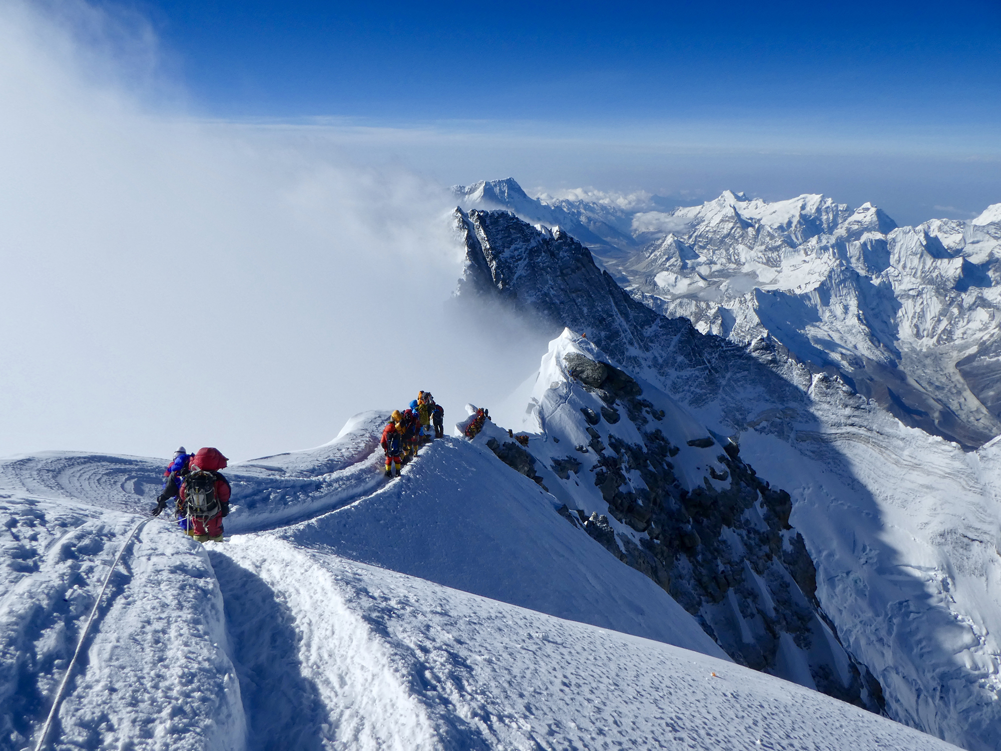 Climbers, including Sophie Hilaire, a 2017 graduate of the Wharton MBA Program, descend from the summit of Mount Everest on May 23.