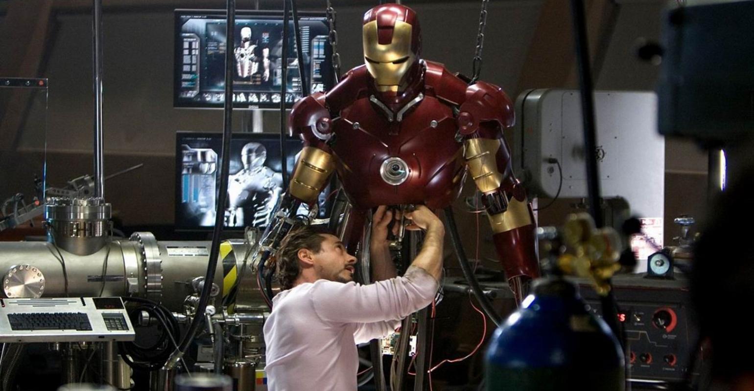 tony stark building the iron man suit in his workshop