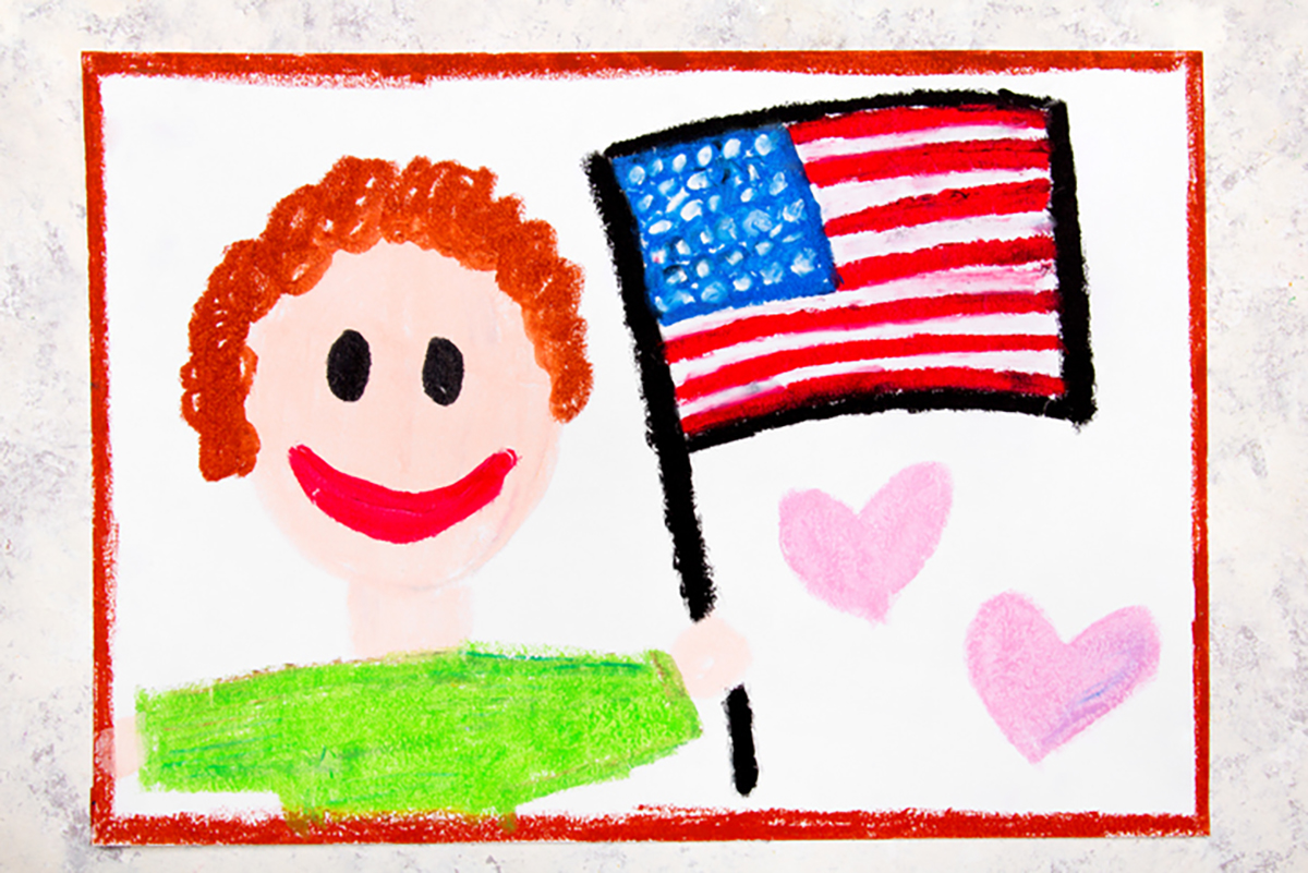 Crayon drawing of person holding an American flag