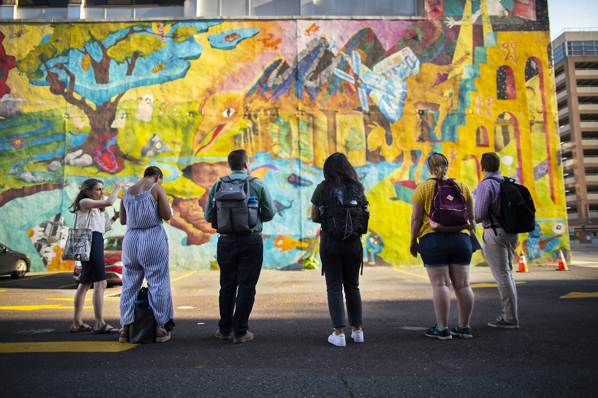 People Painting Murals