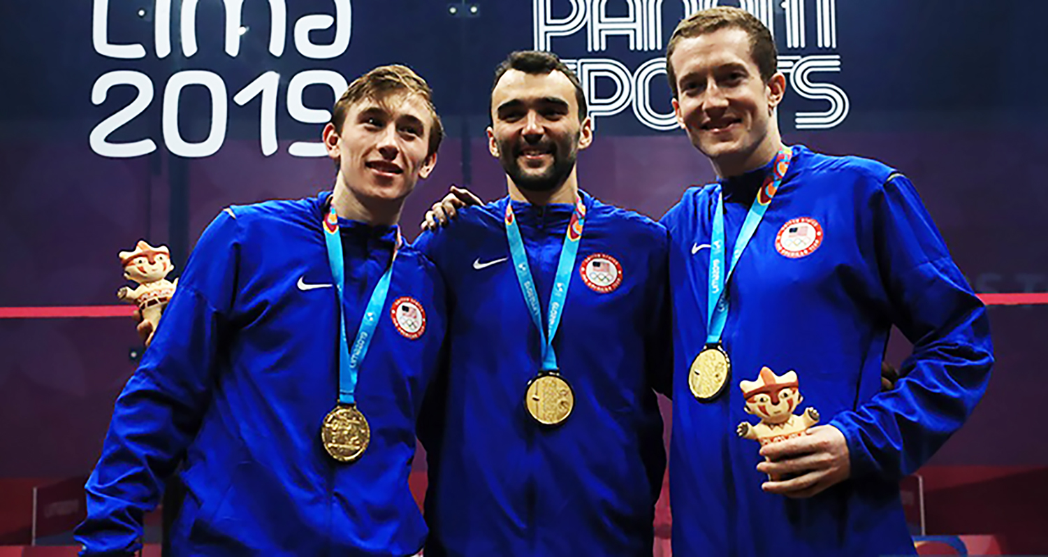 Andrew Douglas, left, poses with the gold medal-winning U.S. men's squash team.