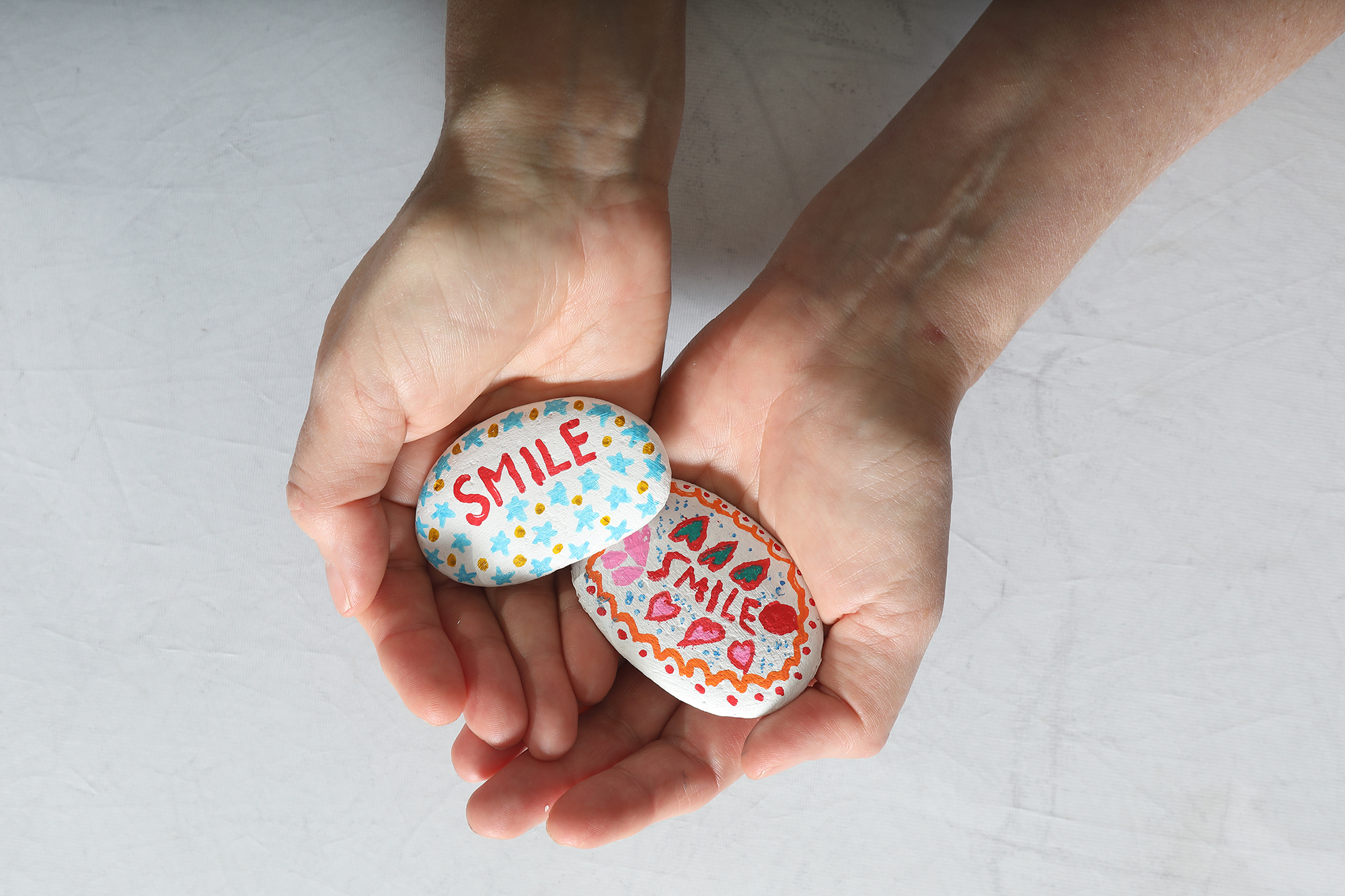 stones painted by dental clinic patients