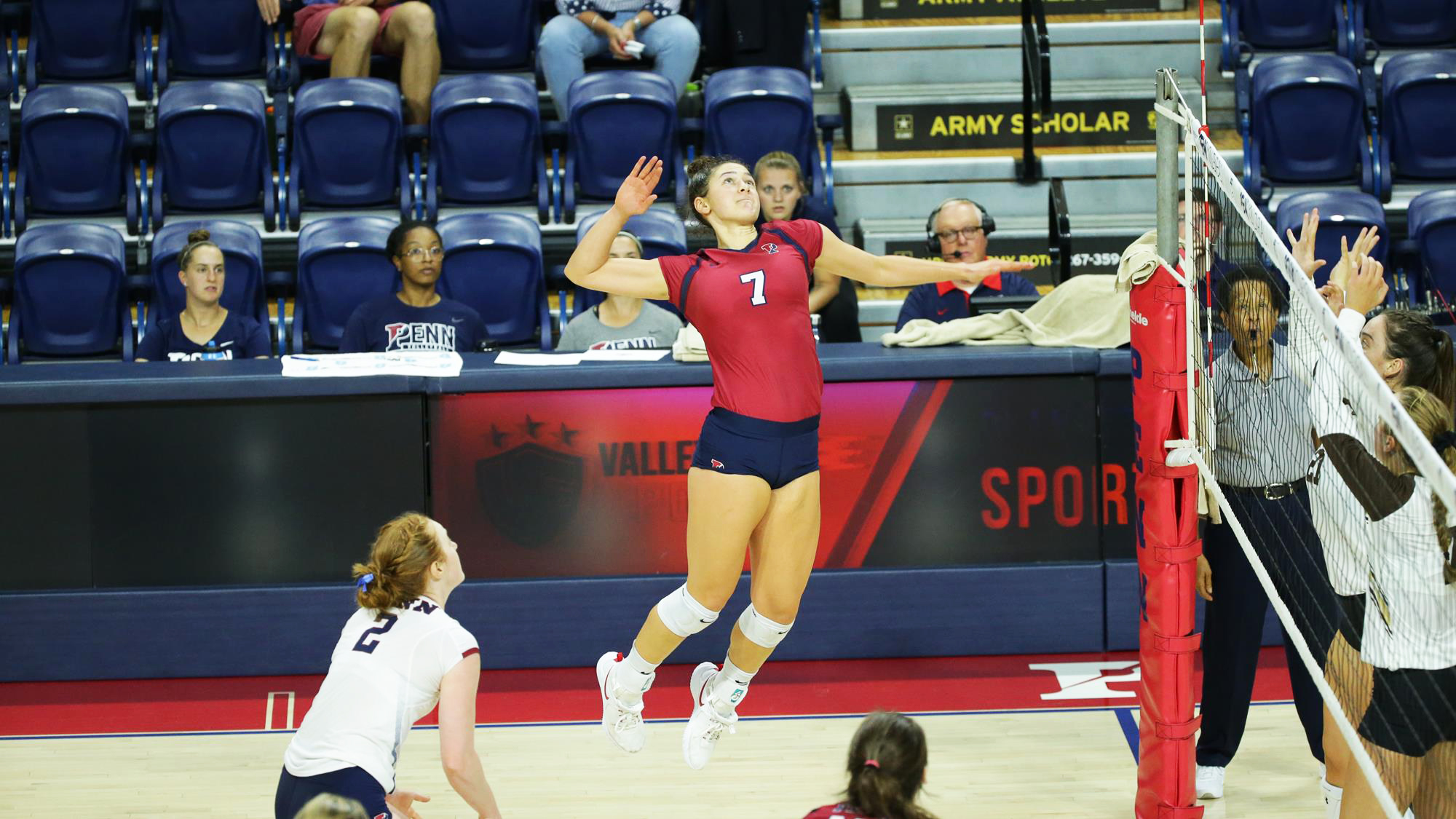 Junior Parker Jones of the women's volleyball team prepares to strike the ball at the Palestra.