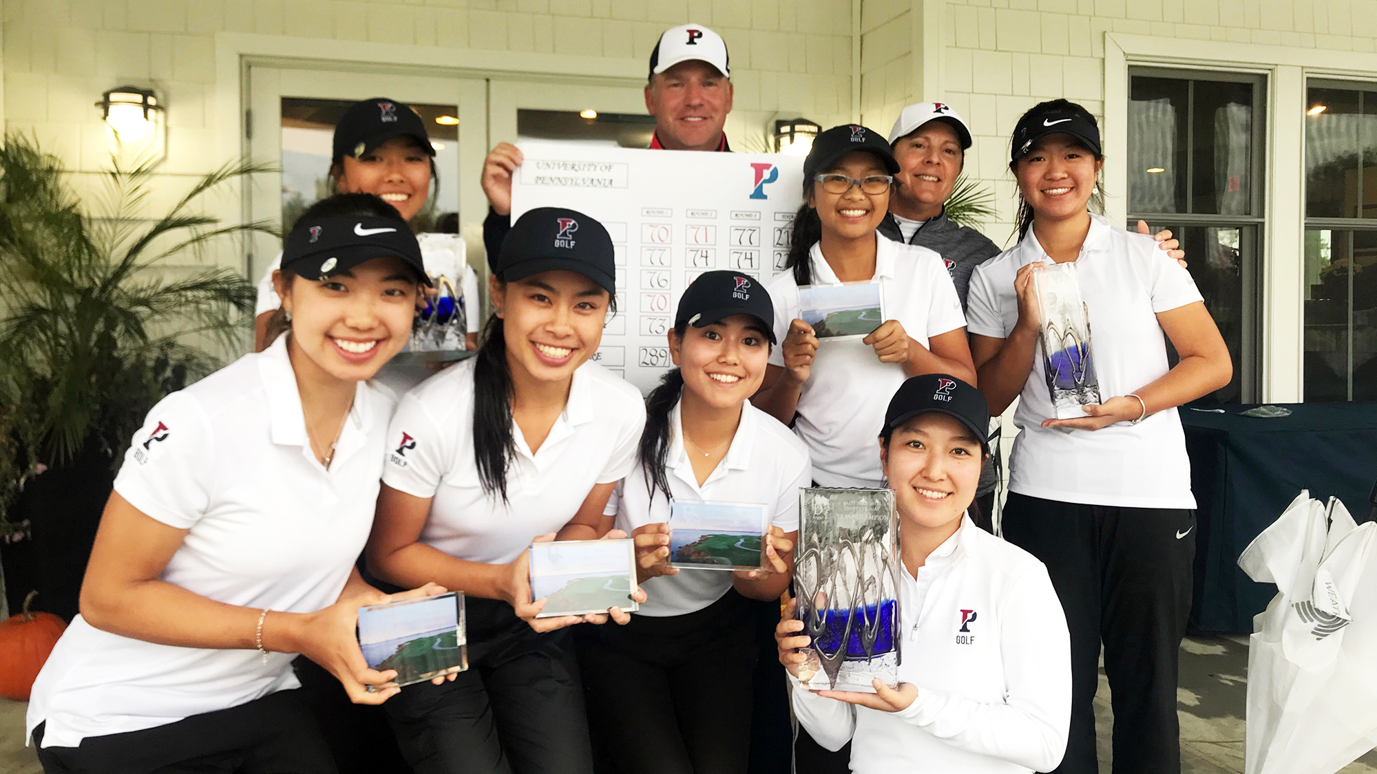 Members of the women's golf team hold their trophies from the Lady Blue Hen Invitational.