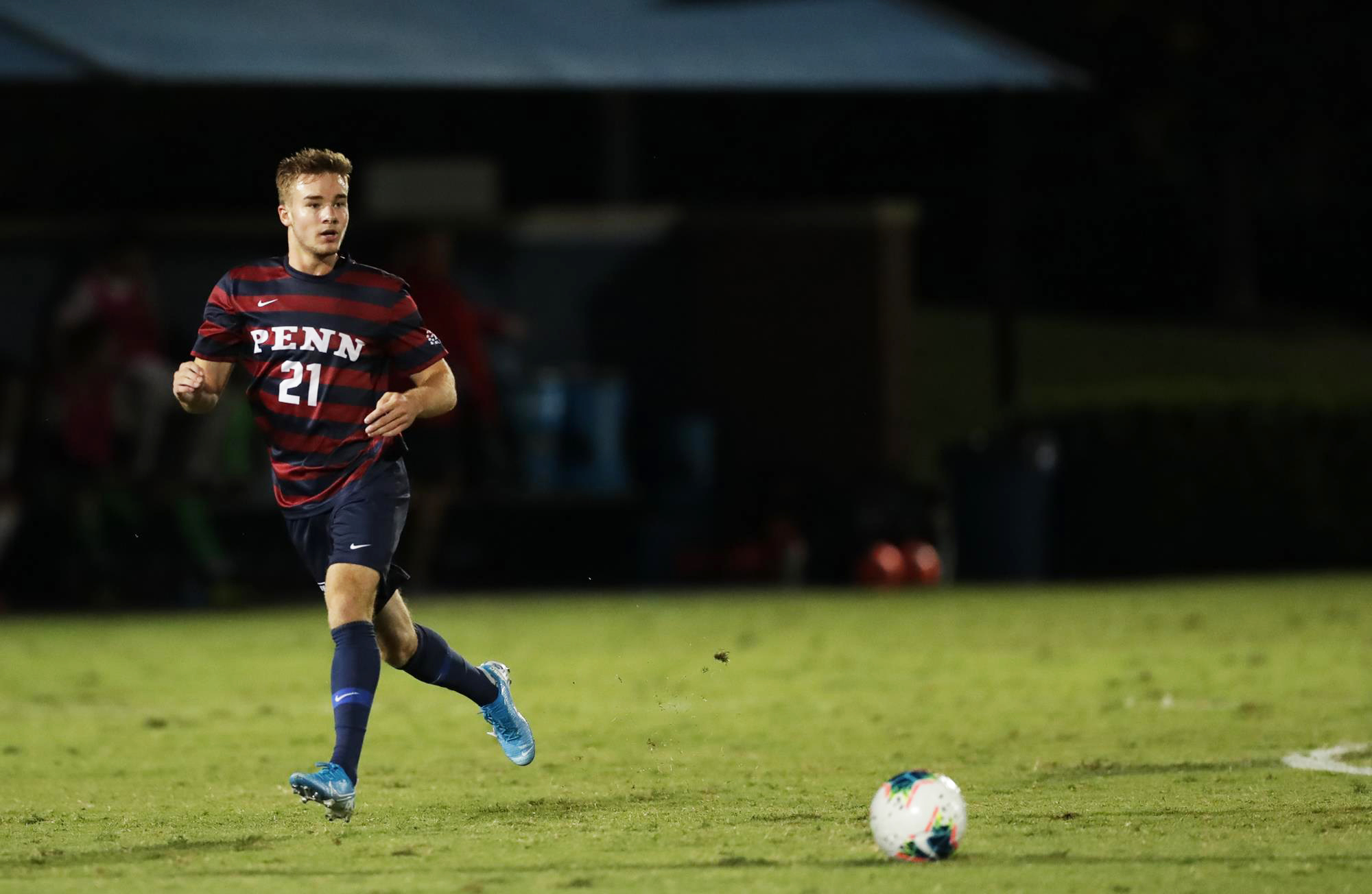 Freshman midfielder Jack Rosener prepares to kick the ball during a game.