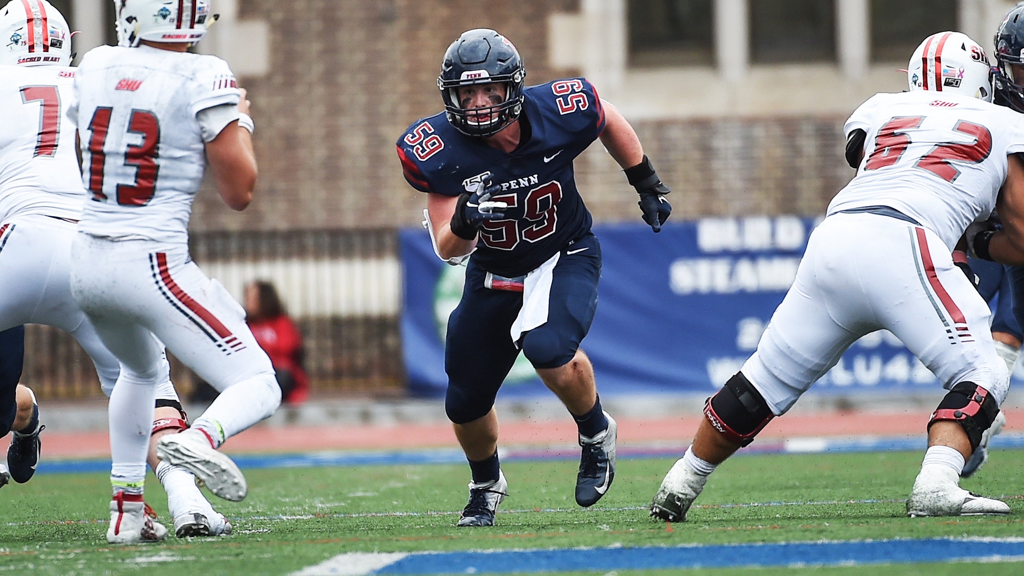 Linebacker Brian O’Neill rushes the quarterback against Sacred Heart.