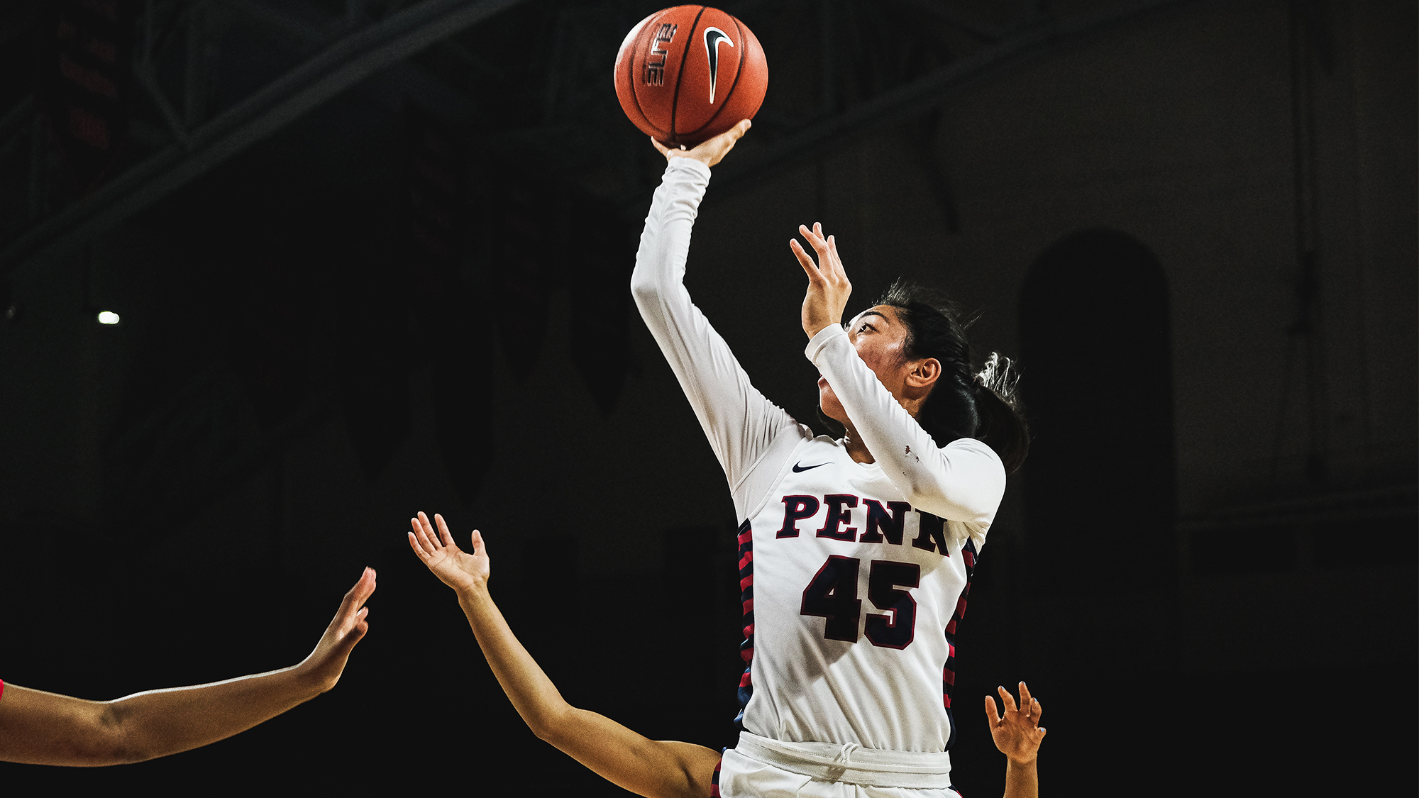 Kayla Padilla shoots a shot with one hand versus Stetson at the Palestra.