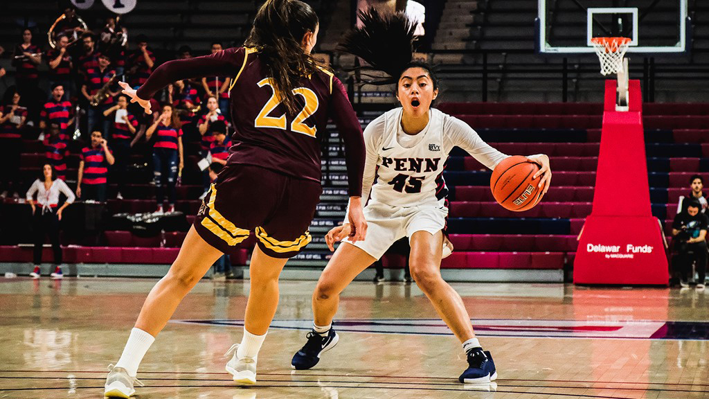 Kayla Padilla prepares to cross over an opponent during a game at the Palestra.