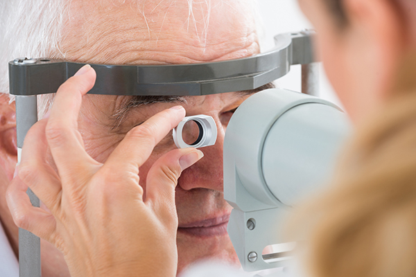 senior citizen getting an eye exam