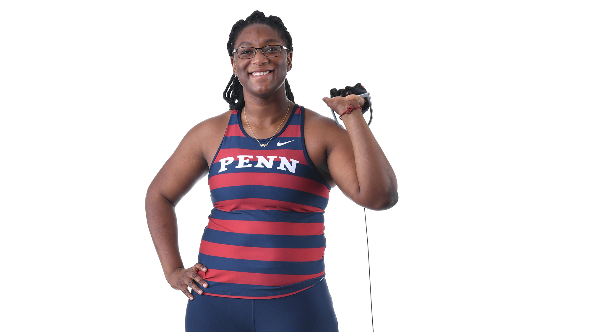 Mayyi Mahama of the track and field team poses in her uniform against a white background.