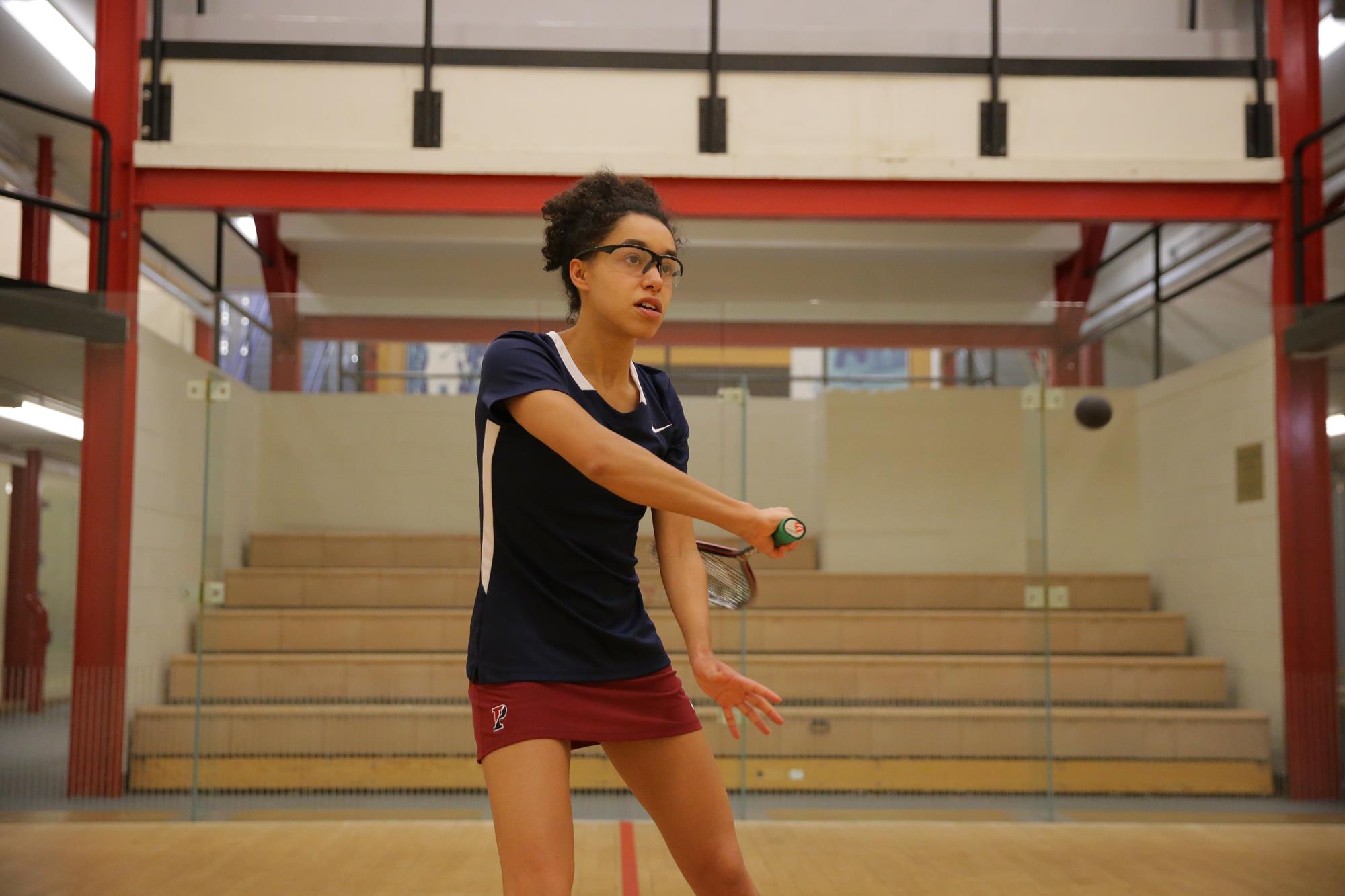 Jessica Davis prepares to swing her racquet during a match.