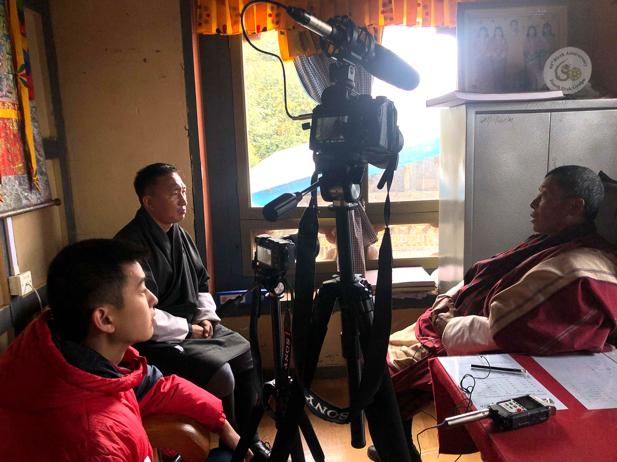 Alina Peng and Charles Zhang interview Bhutan villagers