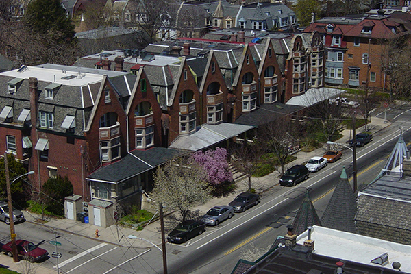Aerial view of a city block of houses in West Philly.