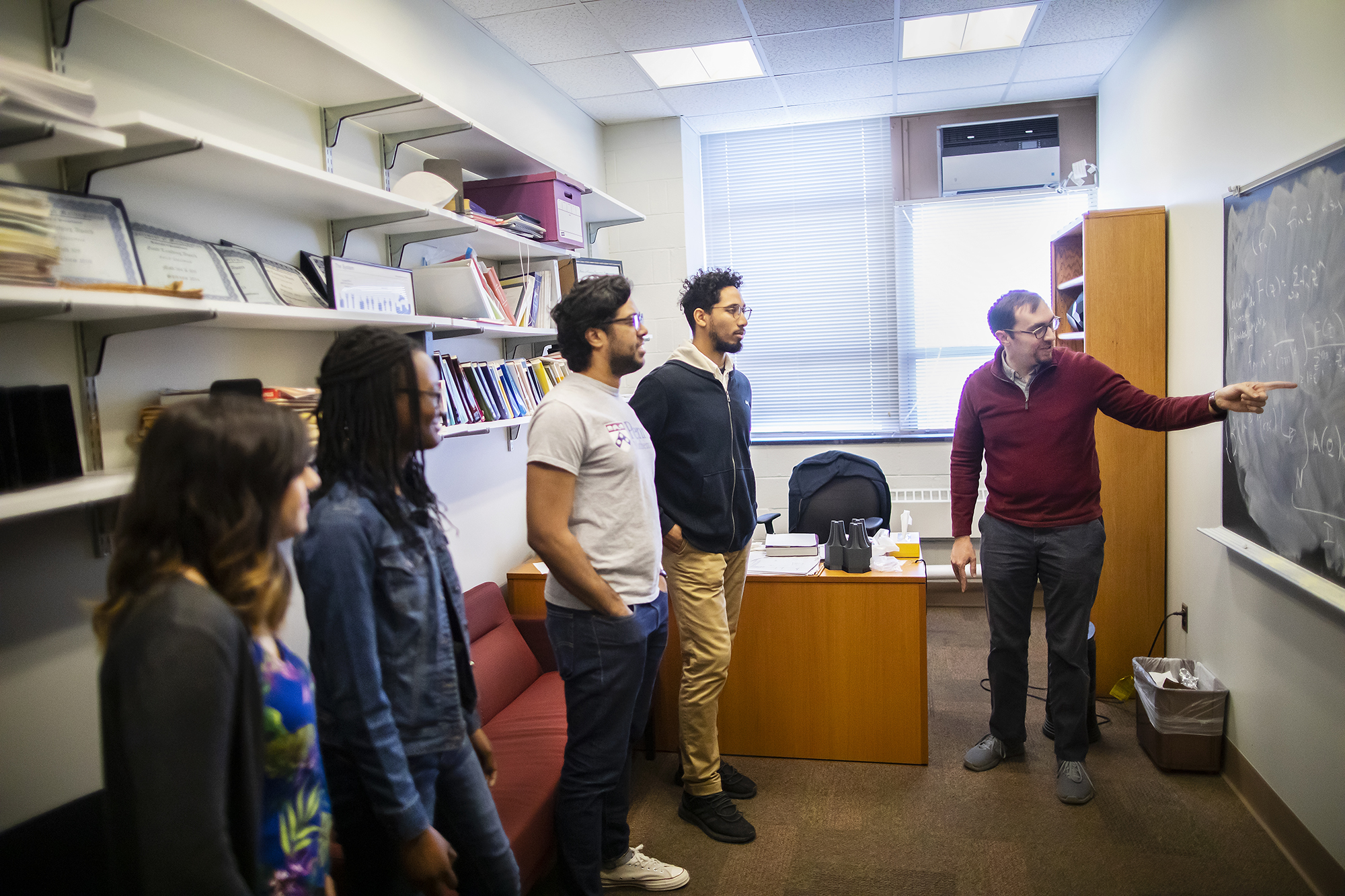 phil gressman lecturing in his office