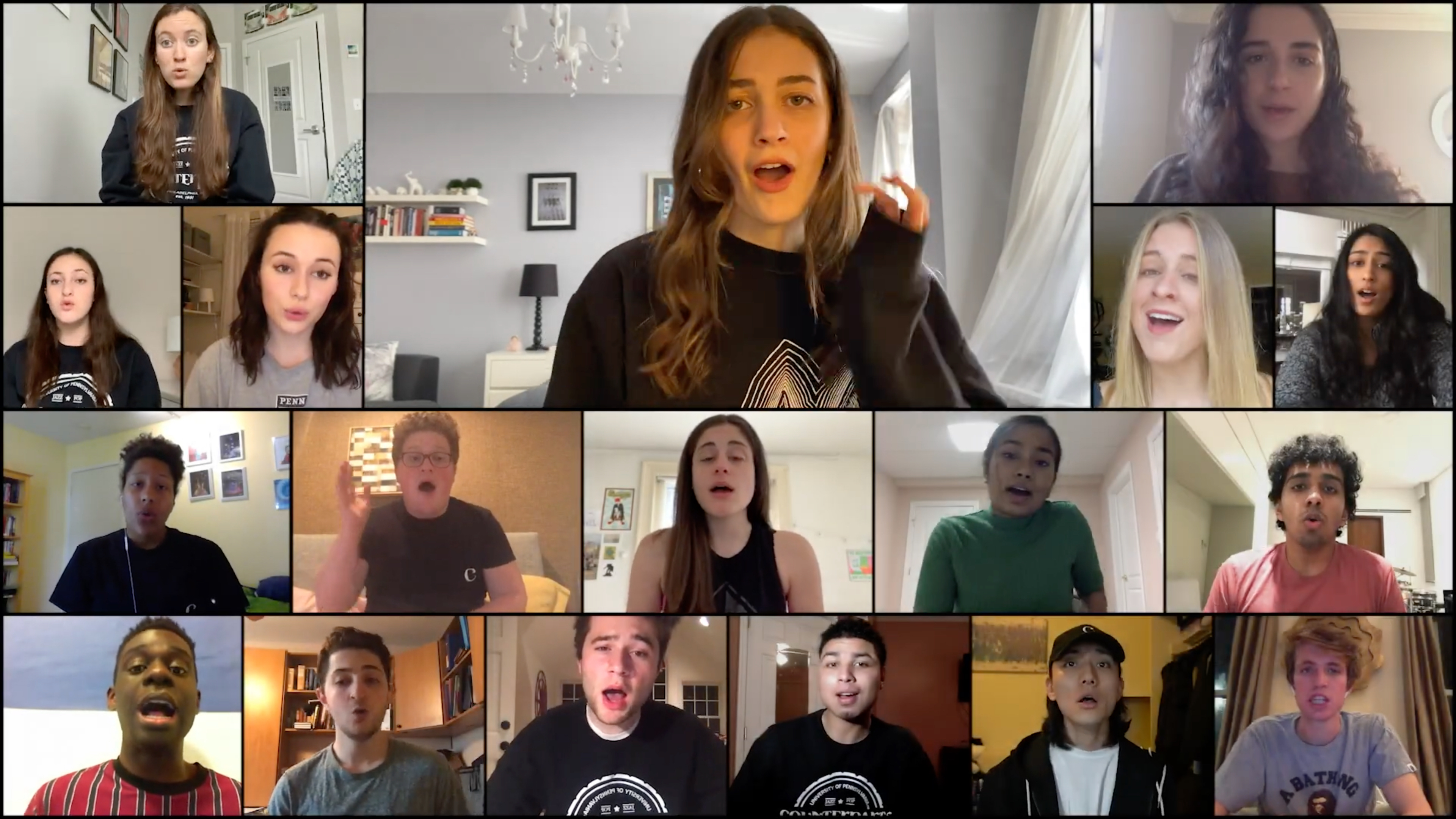 Eighteen students singing in a music video