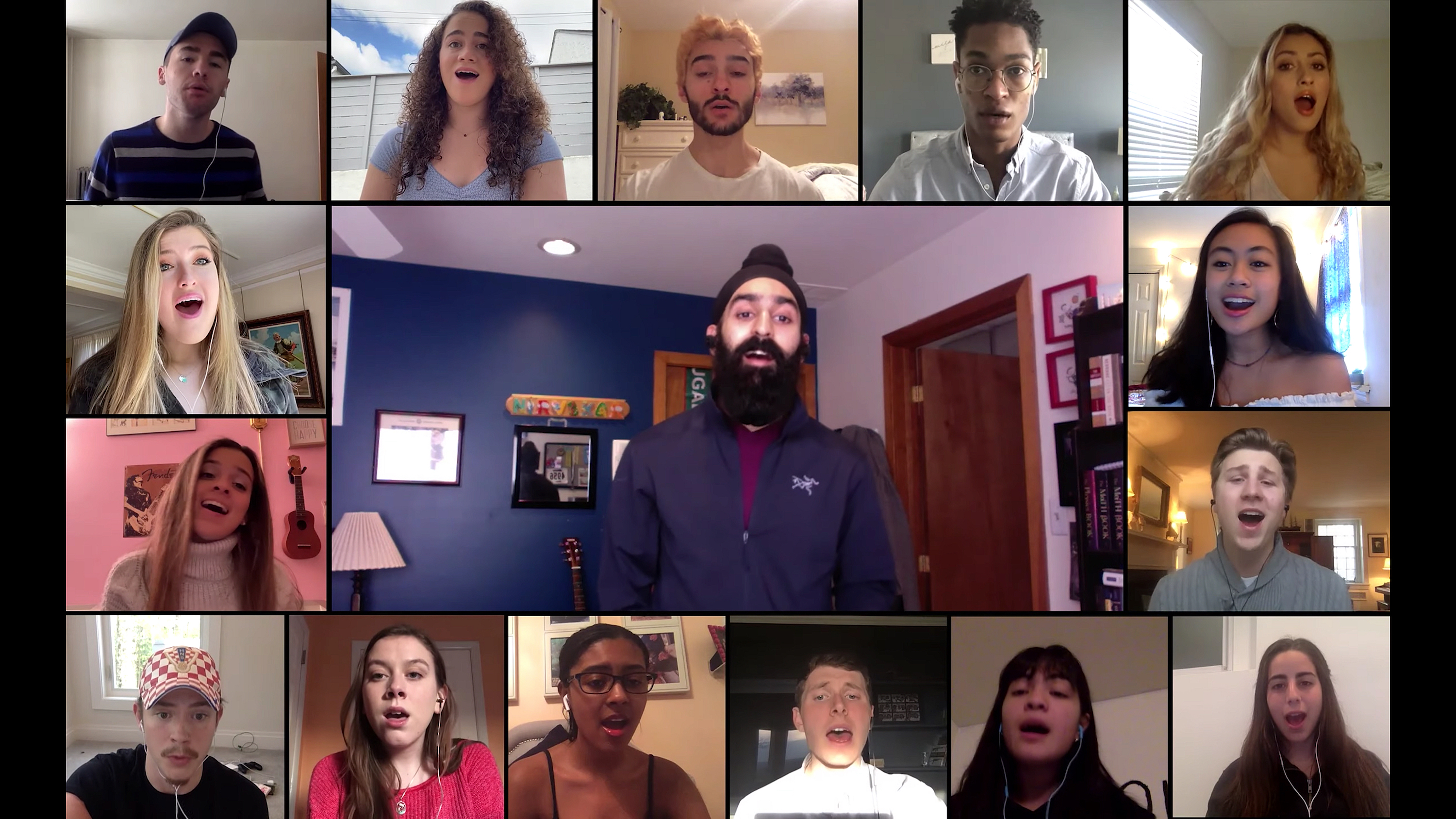 Sixteen students singing in a music video