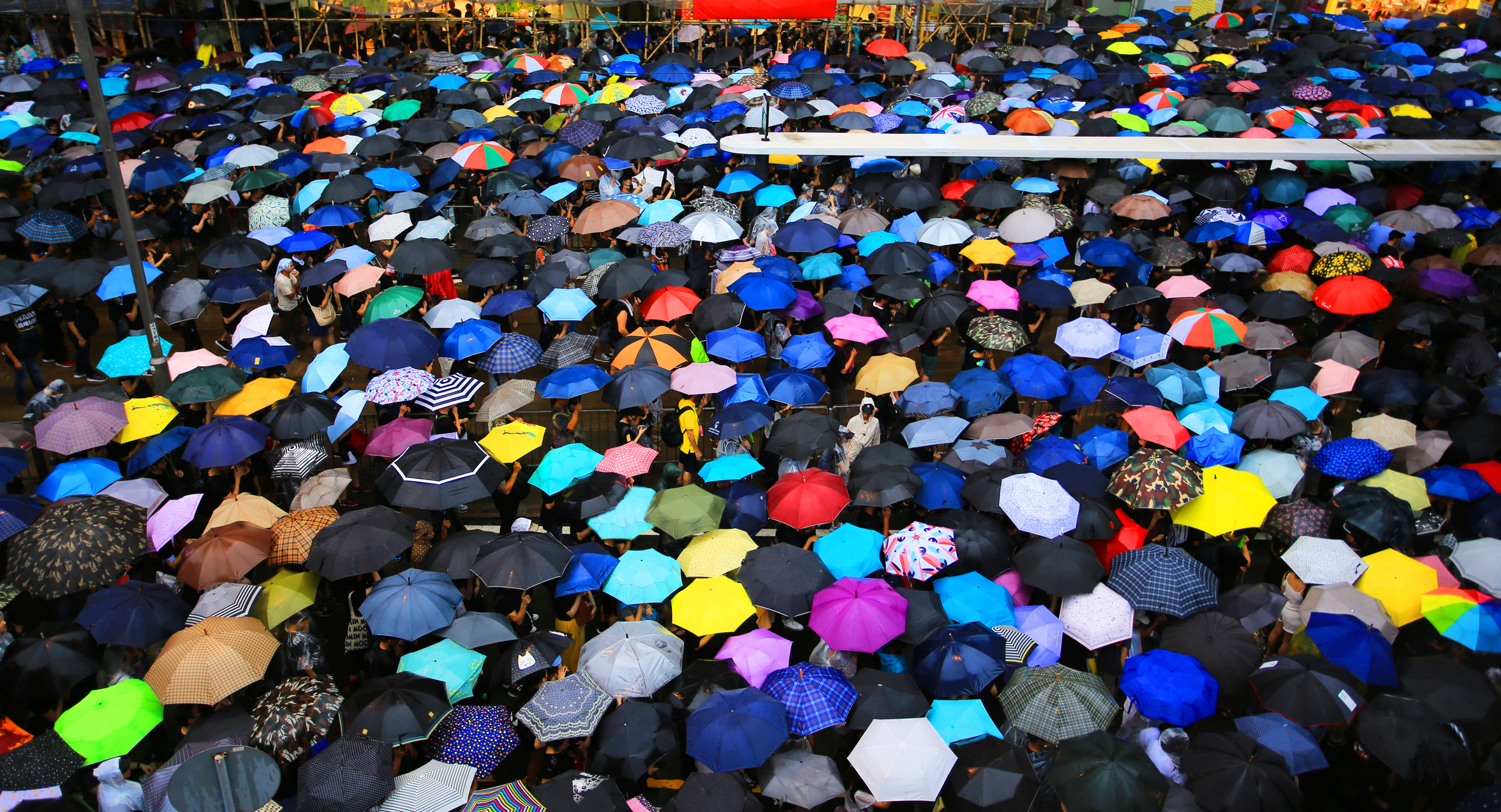 Colorful umbrellas gathered on street