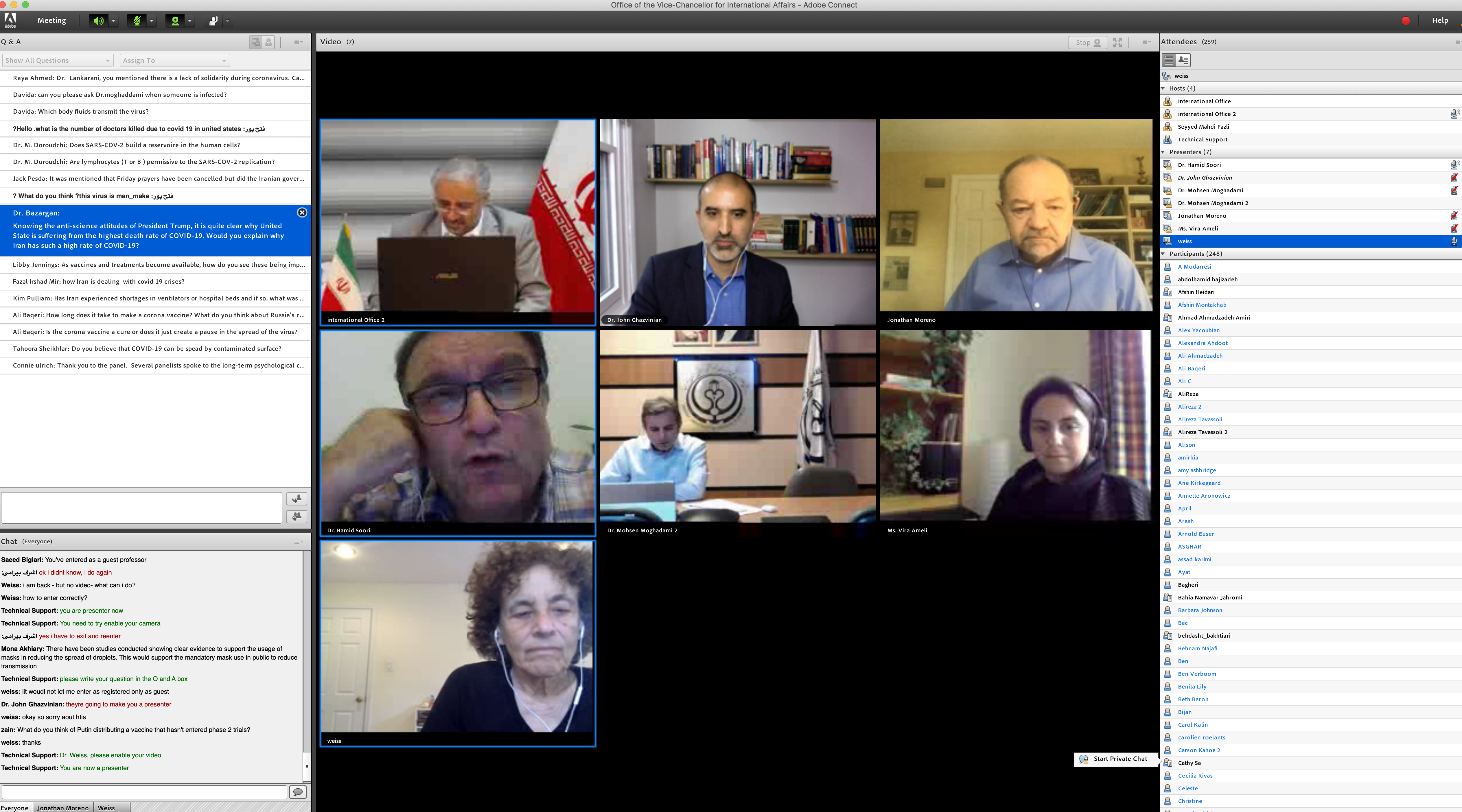 Screen shot of a virtual meeting showing images of seven people 