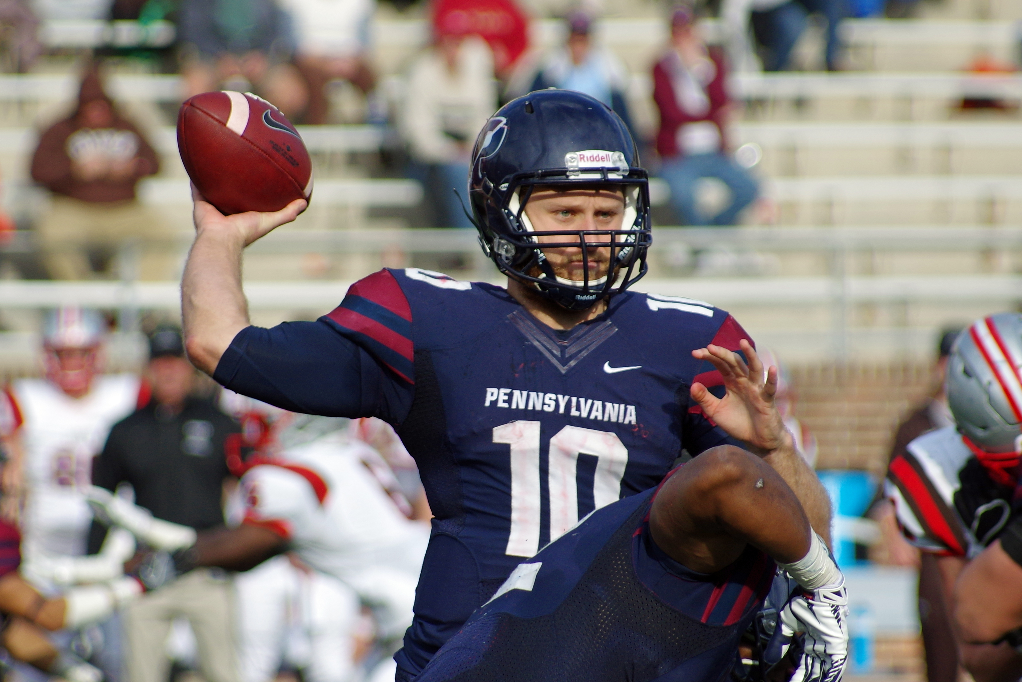 Quarterback Alek Torgersen prepares to throw ball during a game.