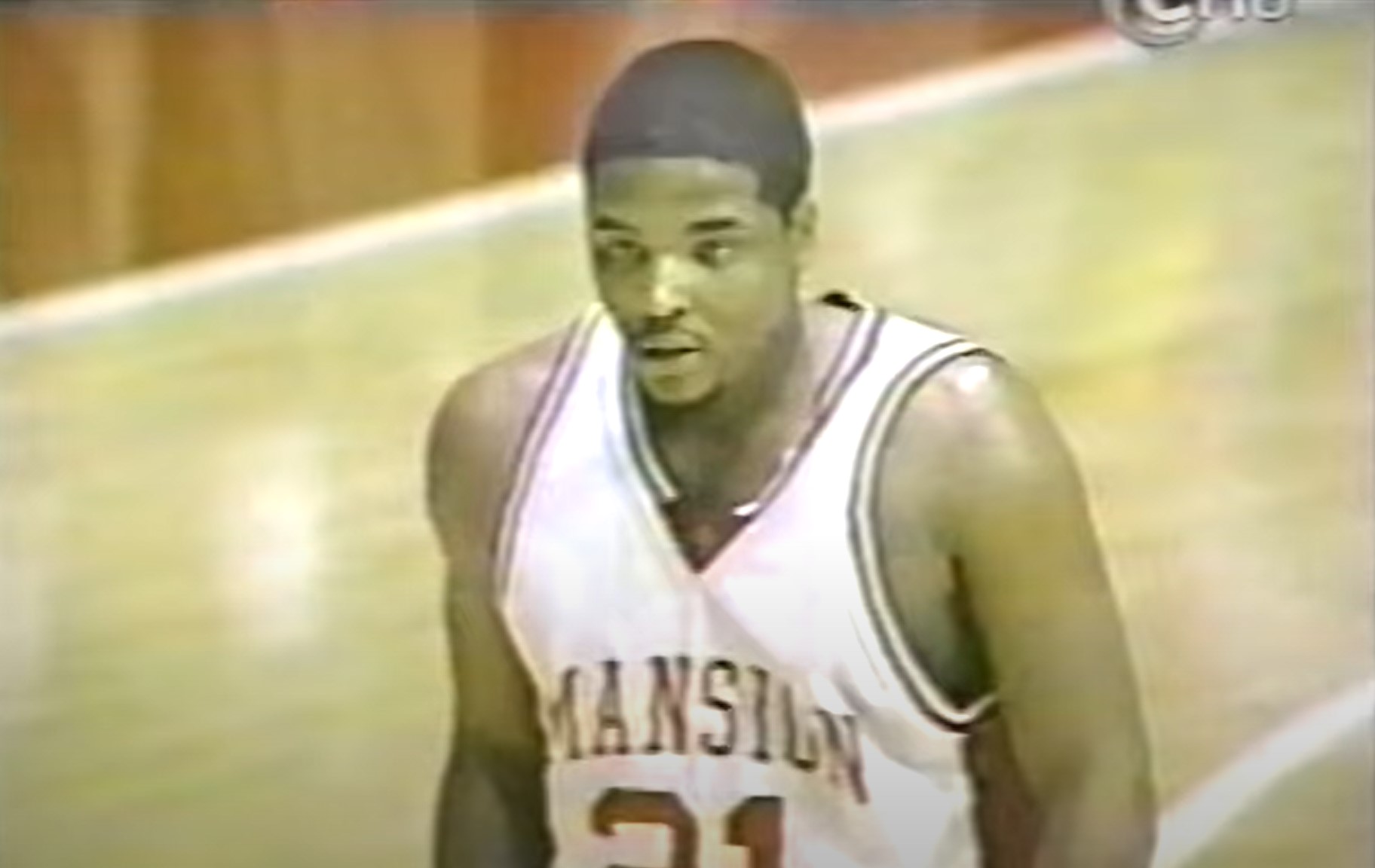 Maurice Rice stands on the basketball court during the game.