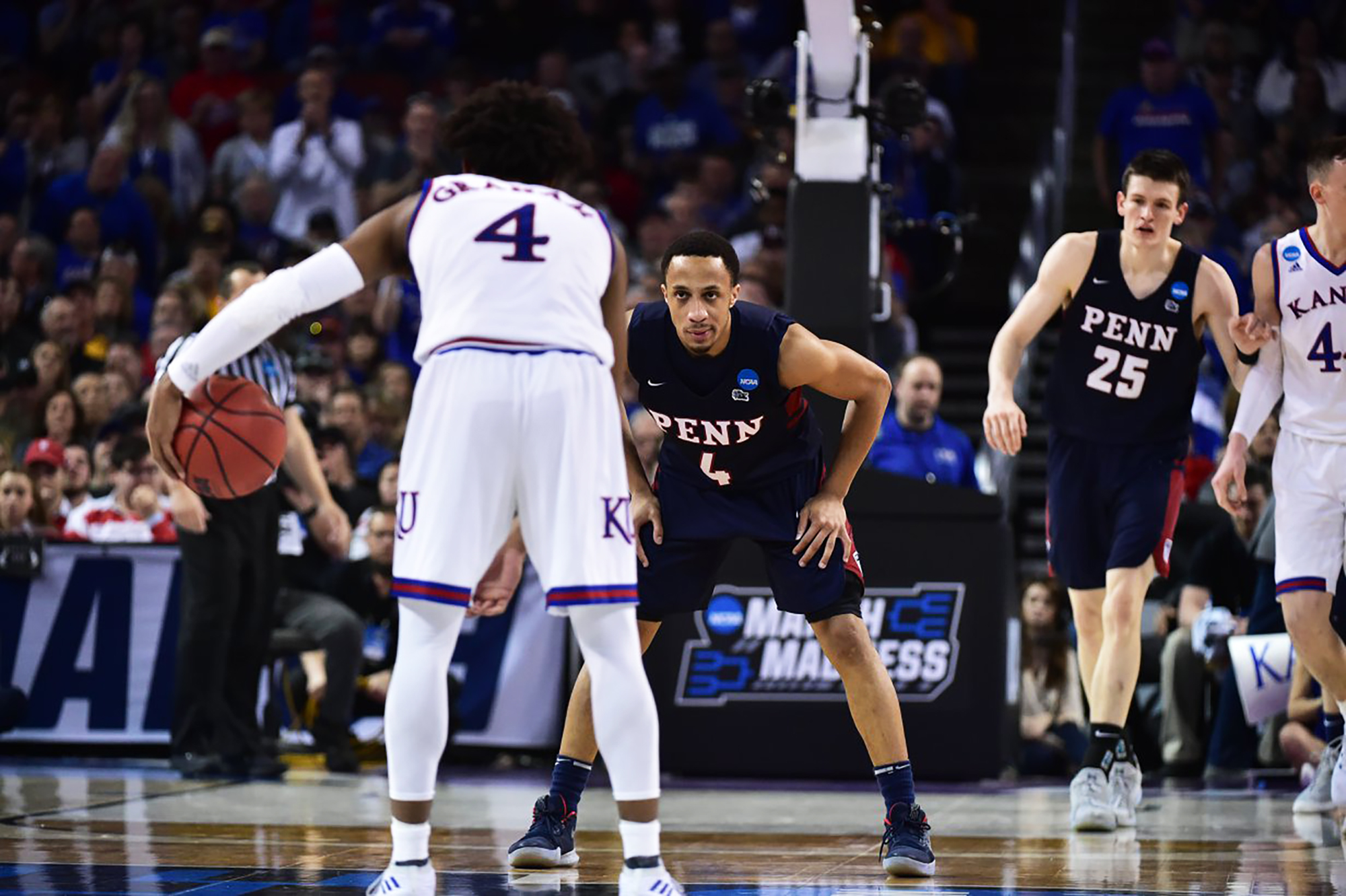 The men's basketball team takes on Kansas during the NCAA Men's Basketball Tournament.