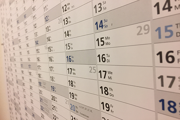 Picture of many days listed on a wall calendar 