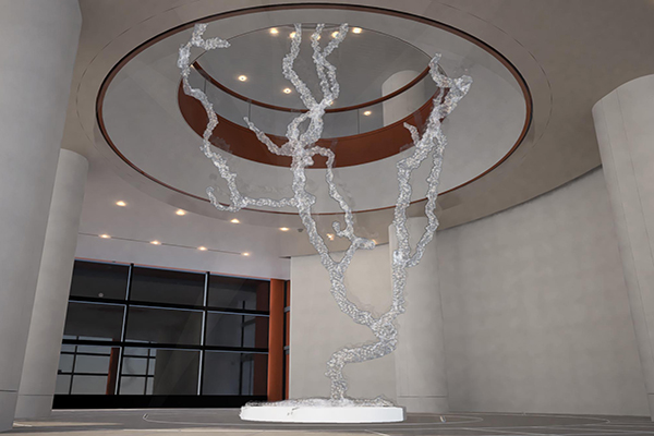 Rendering of Maya Lin’s art installation, a large-scale treelike sculpture with branches reaching upwards through atrium open ceiling.