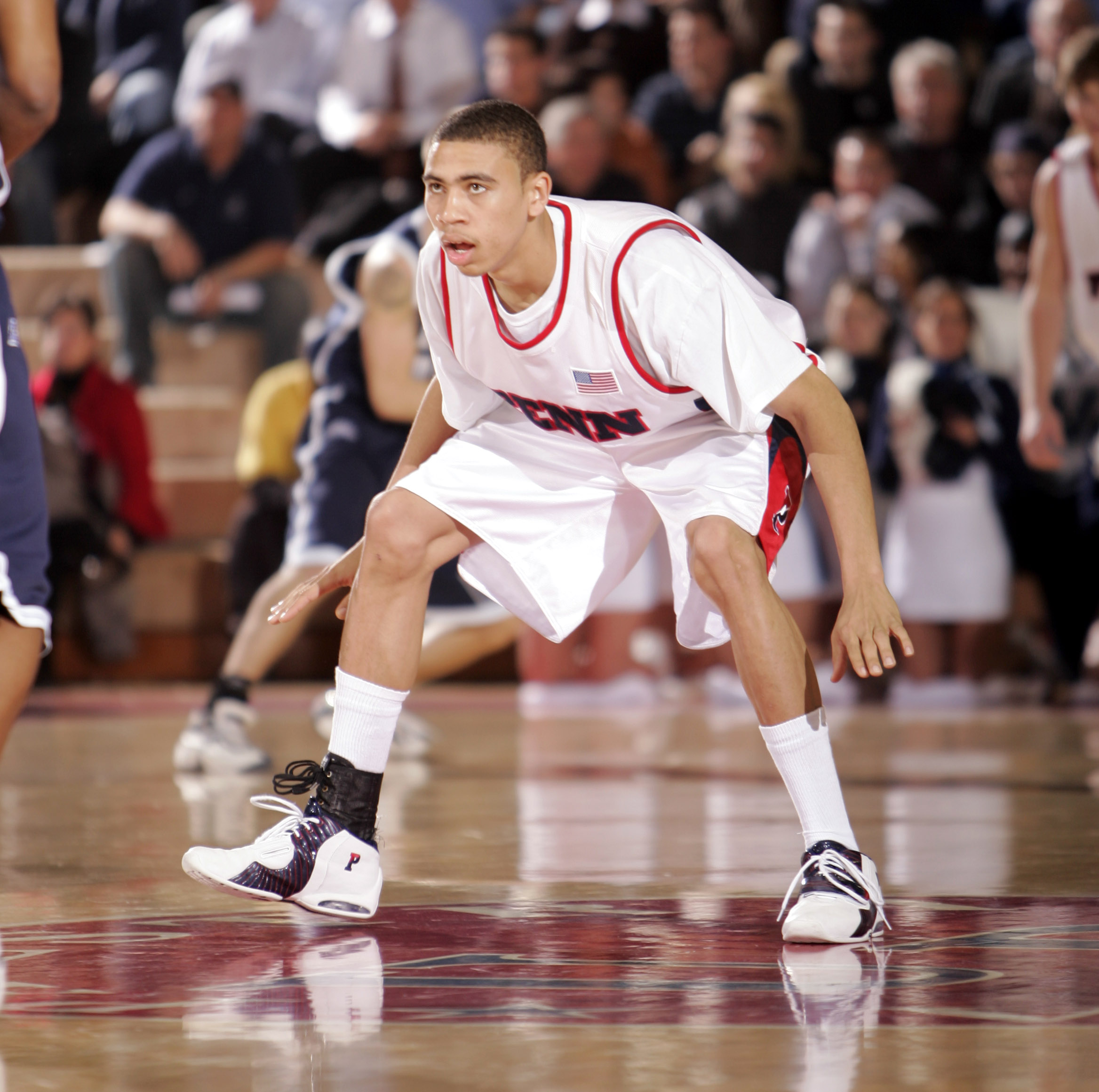 Ibrahim Jaaber plays defense against a defender at home at the Palestra.