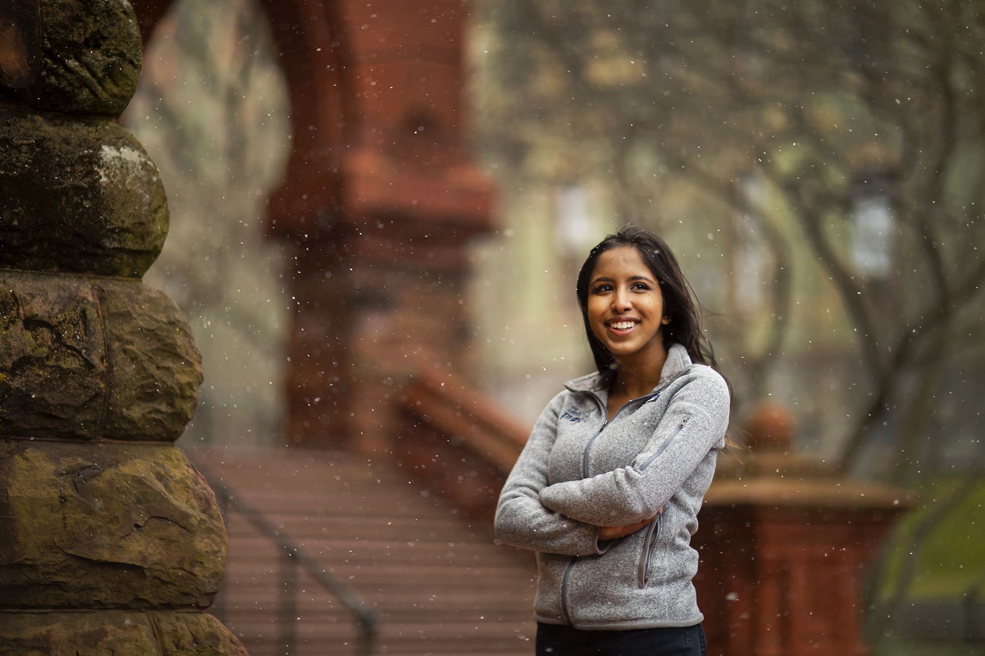 meera menon in front of fisher fine arts library
