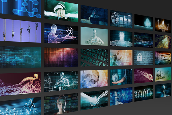 Wall of television screens showing commercial images.