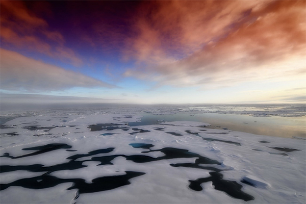 Colorful sky and melting arctic sea ice.