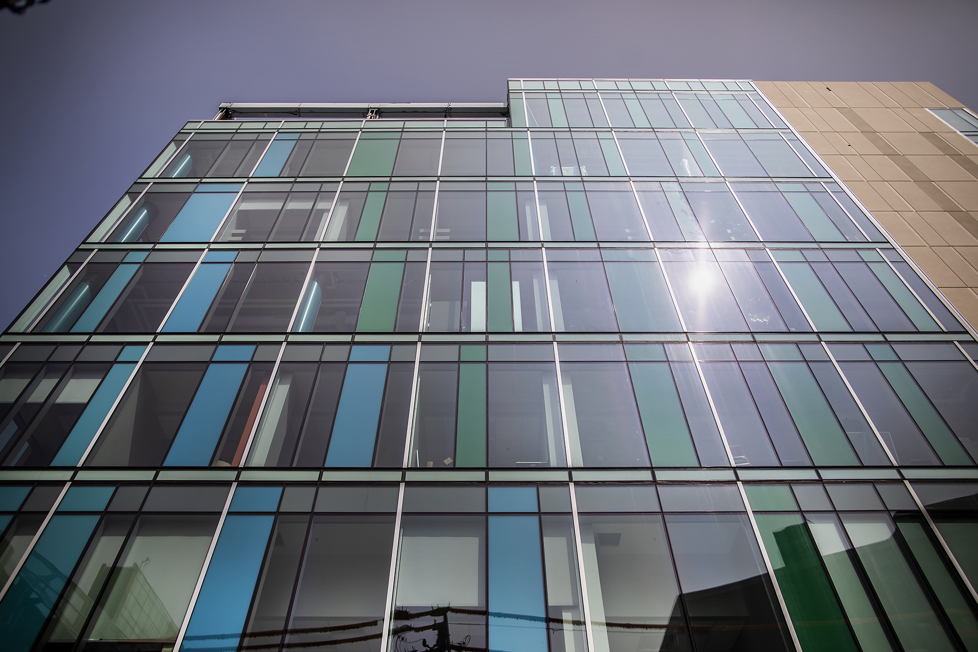 looking up at the facade of tangen hall