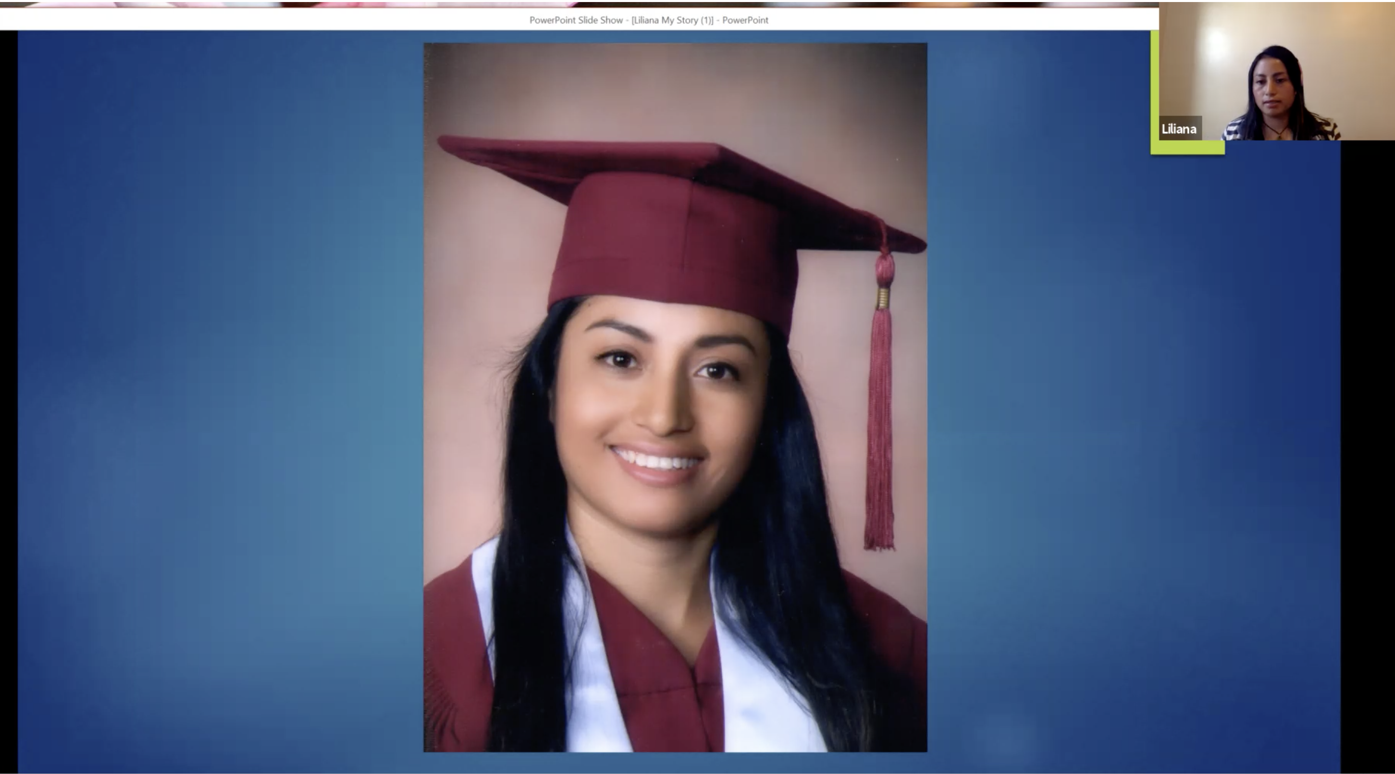 Zoom screen depicting young woman in a graduation cap