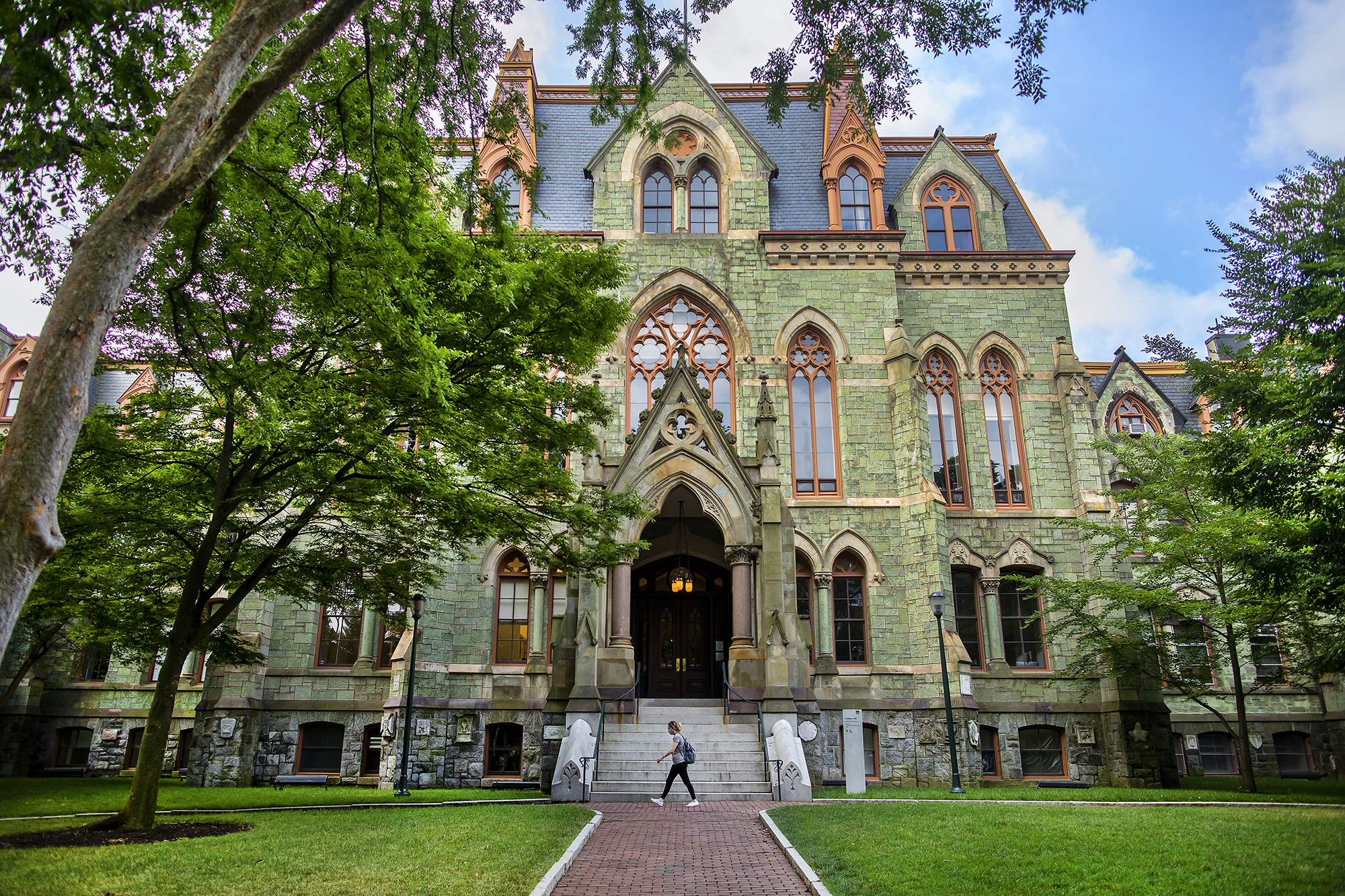 Facade of College Hall seen in daylight from Penn’s College Green.