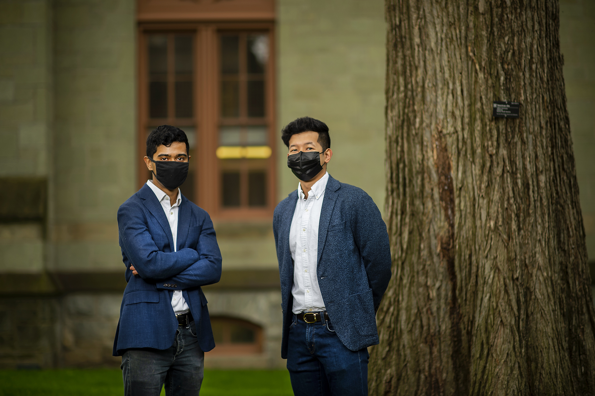 Portrait of the two students standing on Penn campus