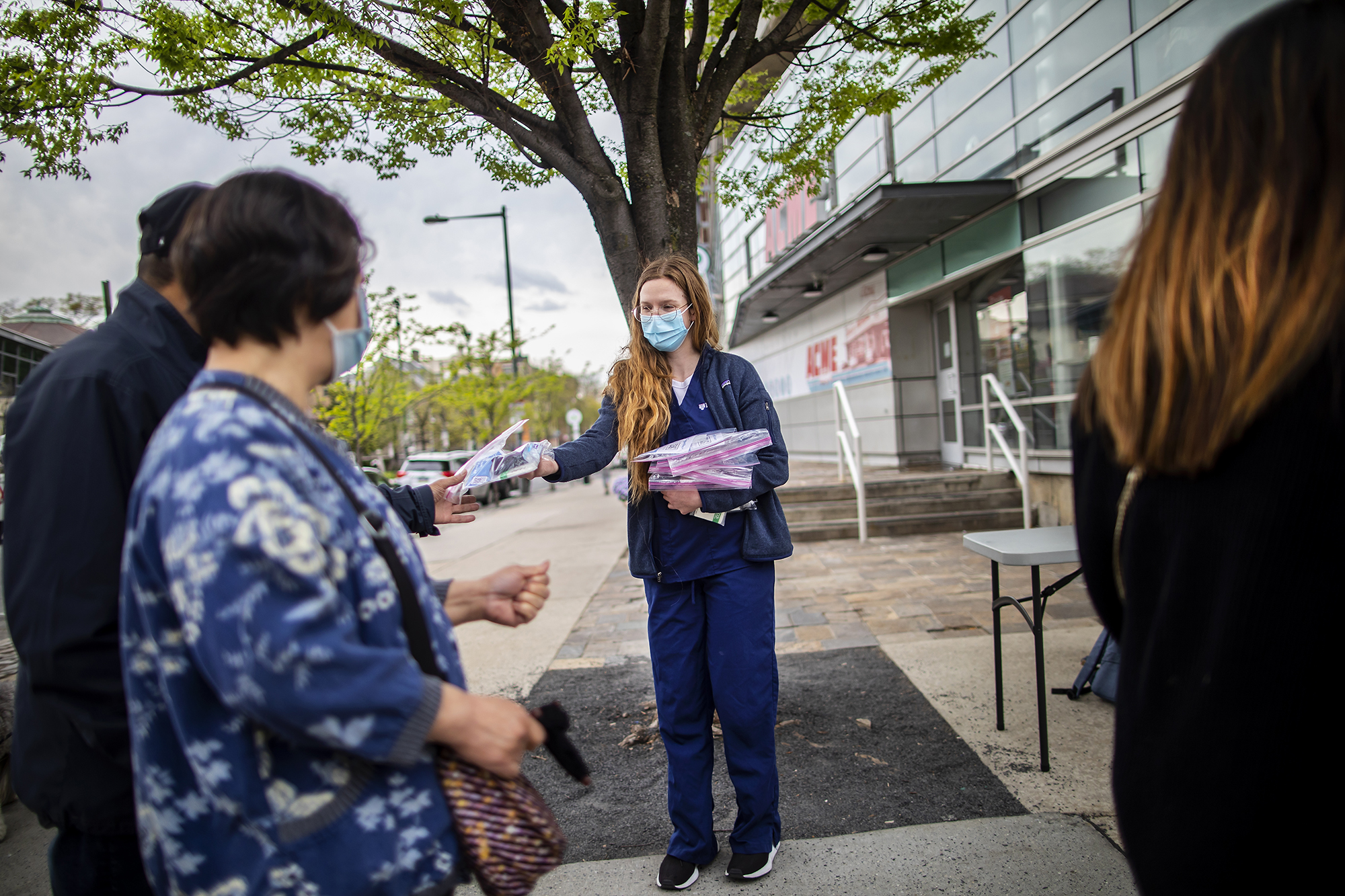 lauren fisher handing out masks