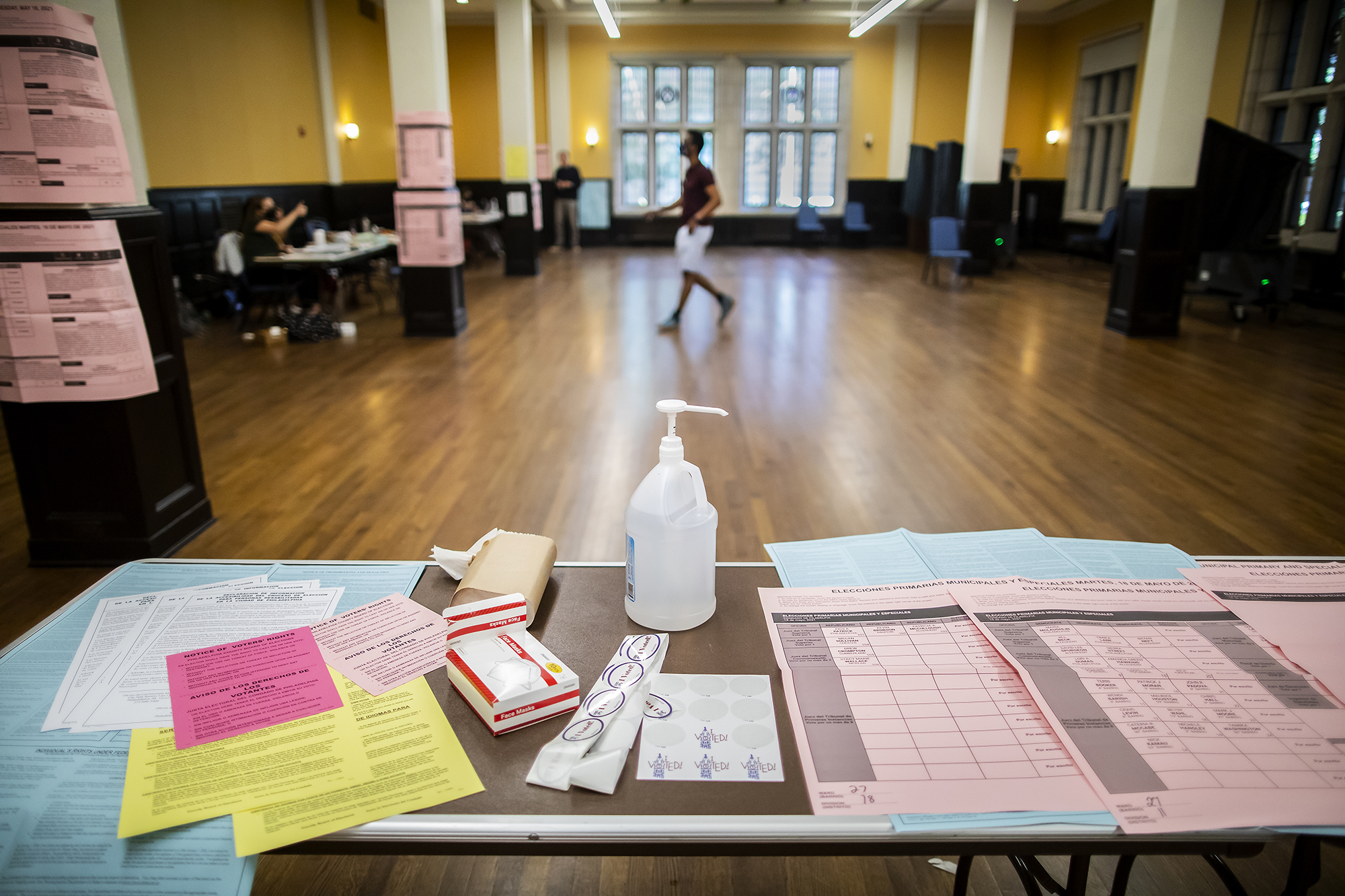 A table in Houston Hall with a sample ballot, I VOTED stickers, and hand sanitizer.