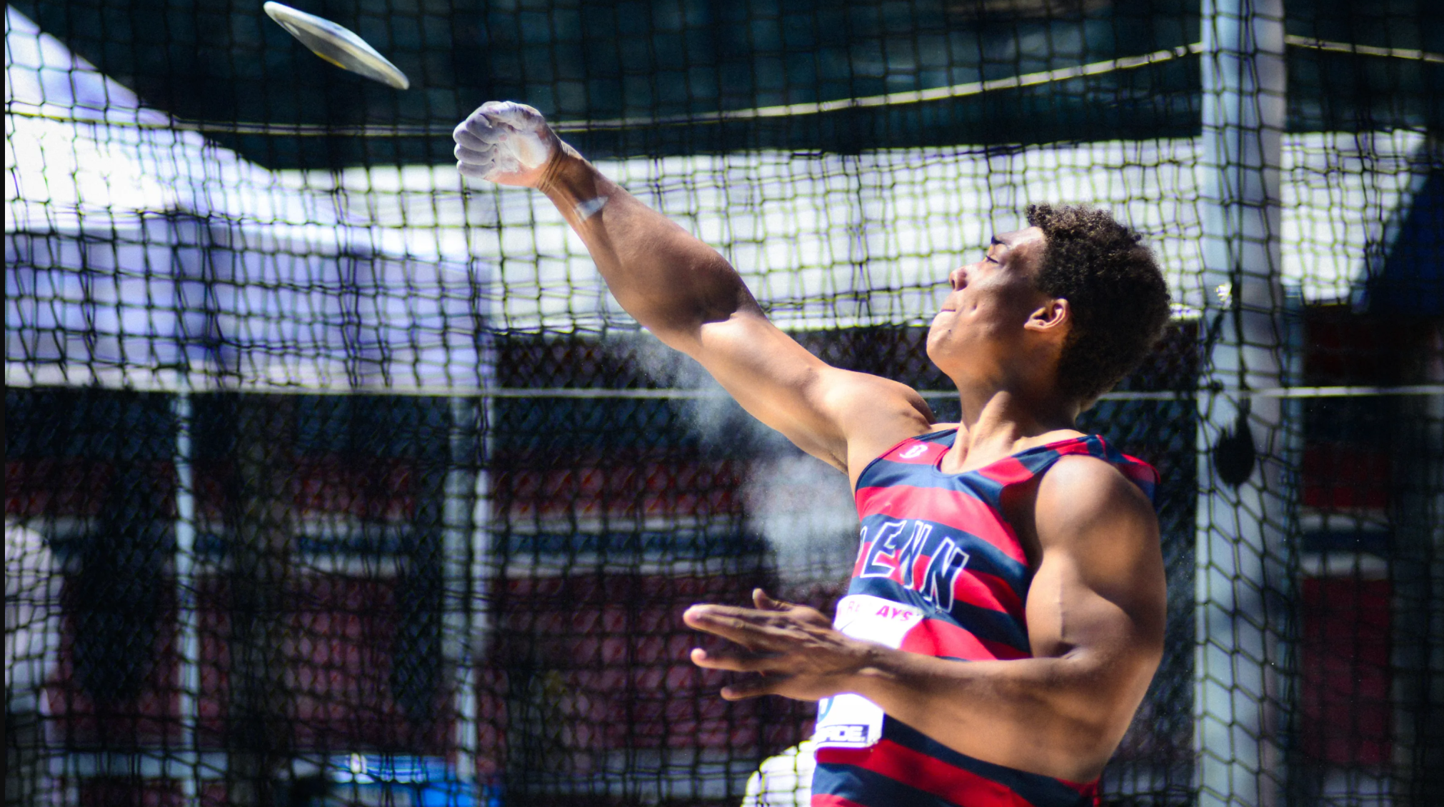 Sam Mattis throws the discus during his Penn days.