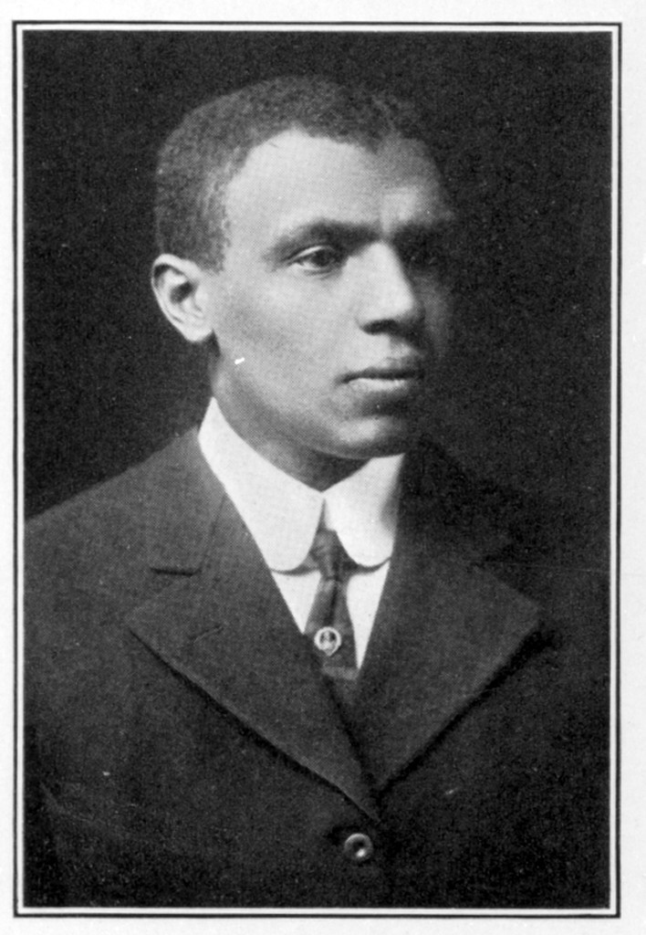 John Baxter Taylor wearing a suit and tie during this time at Penn.