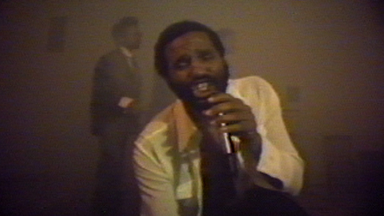 Ulysses Jenkins in front of mic