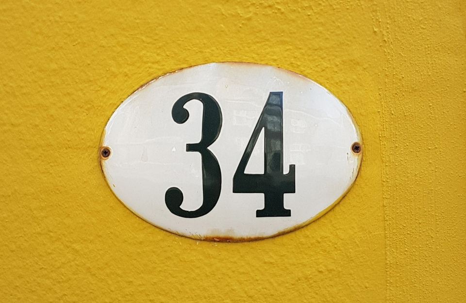 House number sign that reads 34.